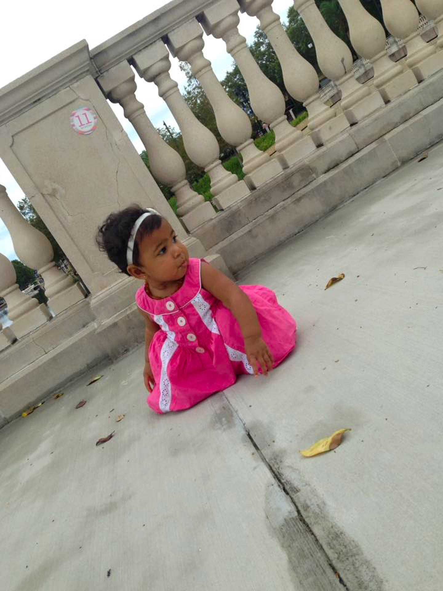 Catalina is registered to the contest to win money with this photo: day, floor, flooring, fun, girl, leg, leisure, person, pink, recreation, sitting, vacation