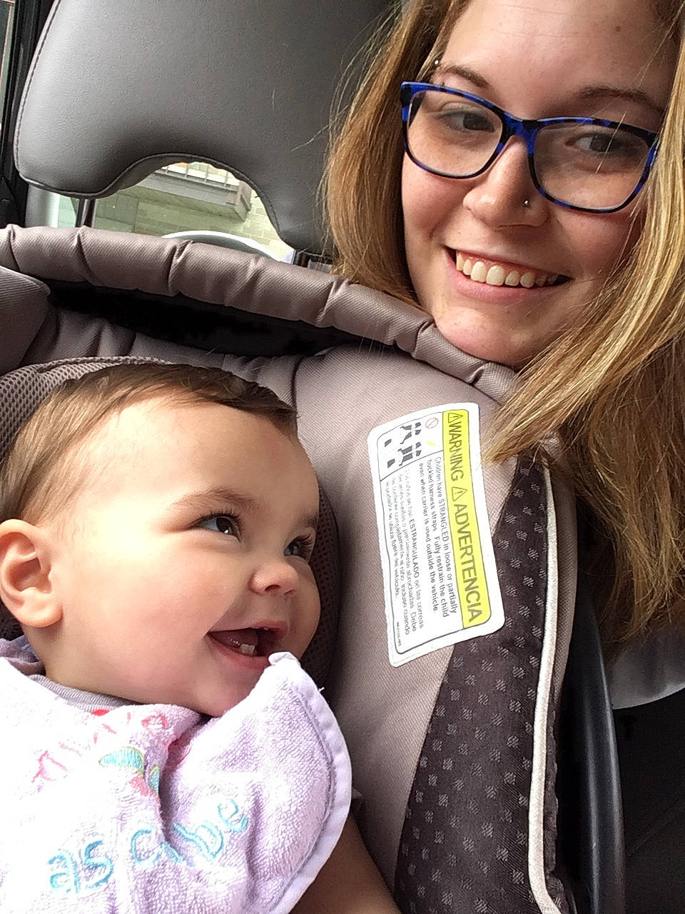 Nathalia is registered to the contest to win money with this photo: baby, car_seat, child, daughter, eyewear, glasses, happy, joy, mother, nose, person, product, selfie, skin, smile, toddler, vacation, vision_care