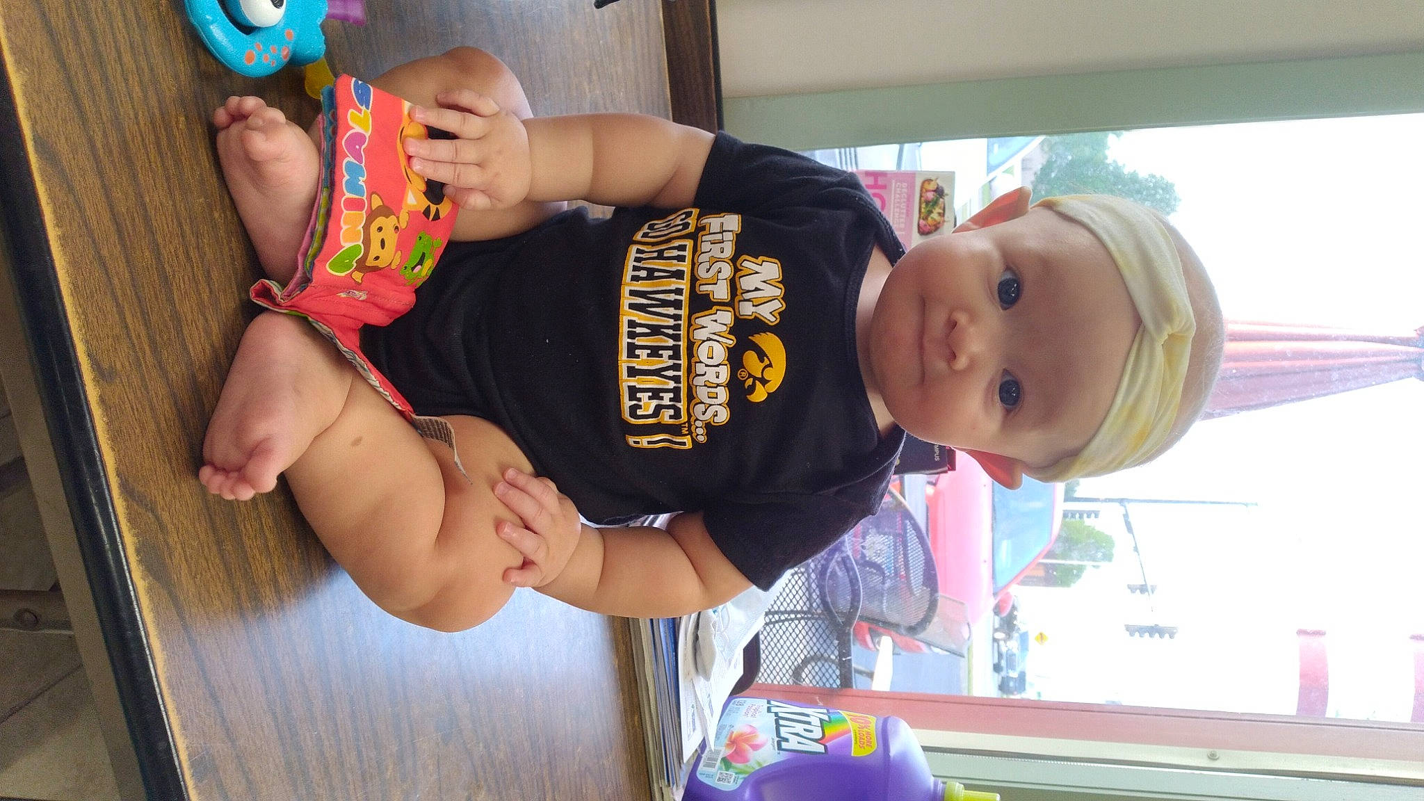 Remi is registered to the contest to win money with this photo: arm, baby, baby_toddler_clothing, blurred, child, elbow, finger, fun, hand, happy, headwear, human_body, human_leg, joint, leg, leisure, person, product, skin, smile