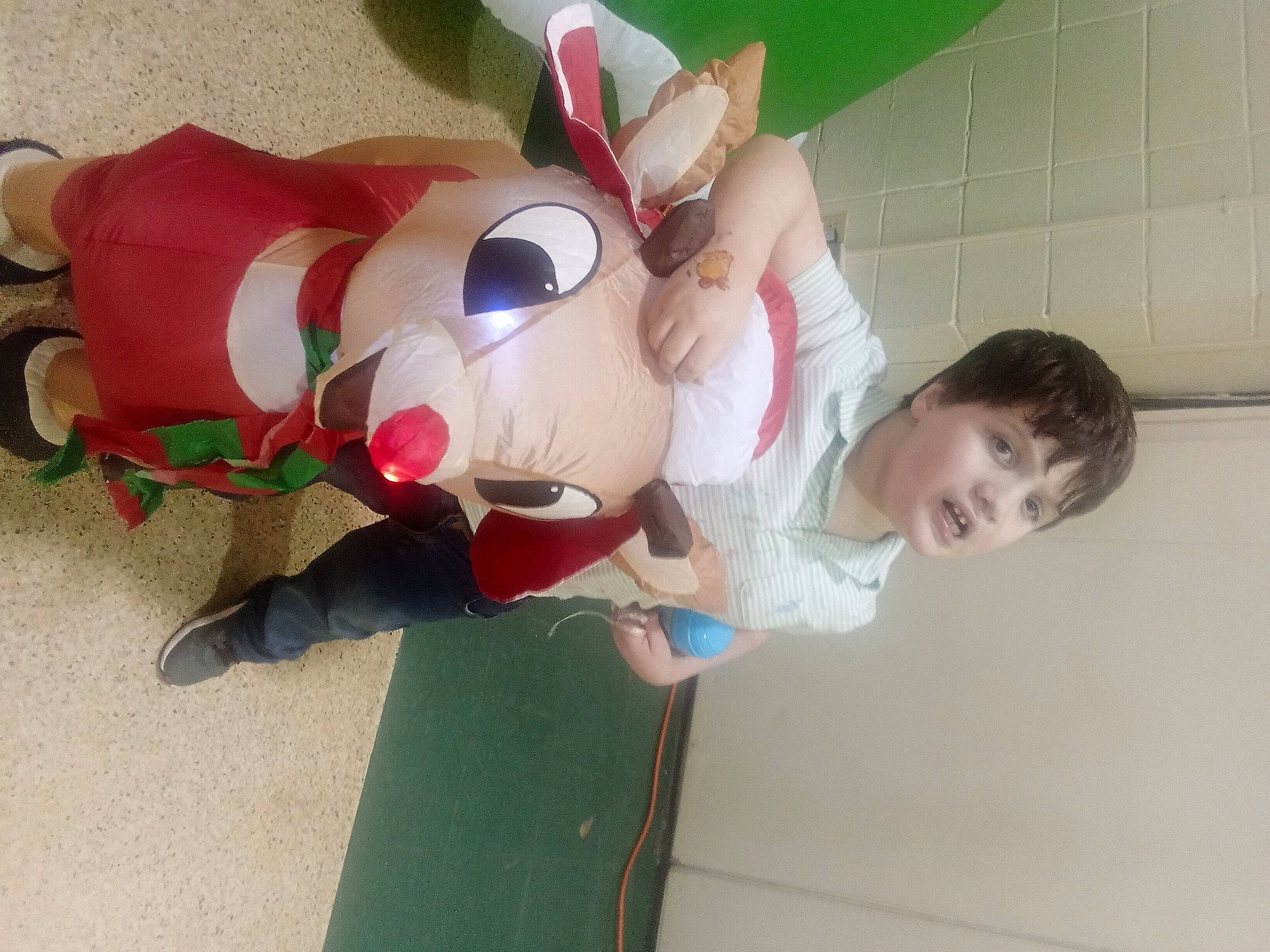 Karson is registered to the contest to win money with this photo: animation, baby_products, baby_toys, carmine, child, fictional_character, flooring, fun, happy, mascot, person, play, plush, room, stuffed_toy, toddler, toy, wood