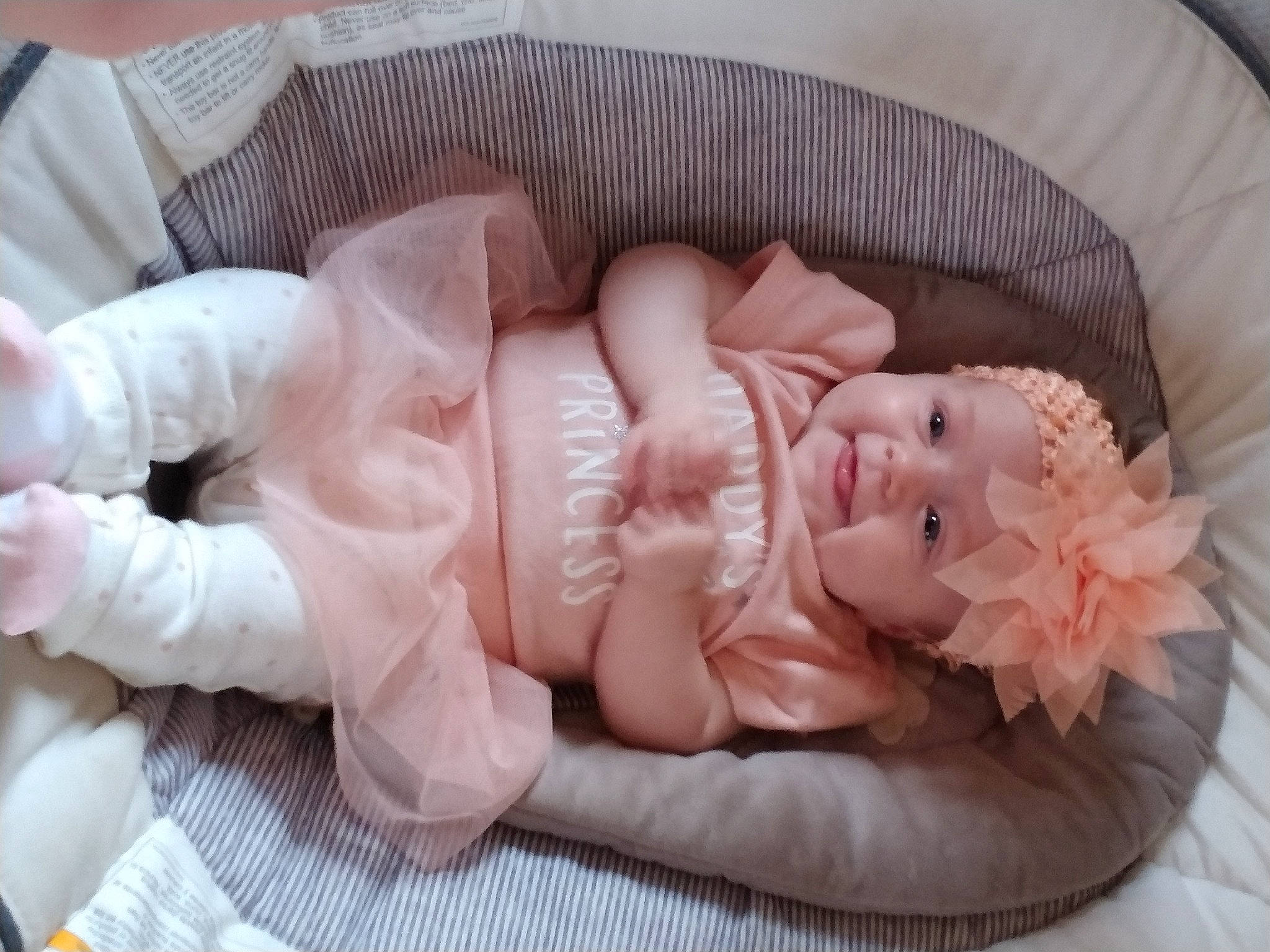 Harper joined the competition — help win amazing prizes! baby, baby_products, baby_safety, baby_sleeping, baby_toddler_clothing, bed, bedding, bedtime, child, comfort, fashion_accessory, hair_accessory, headgear, headwear, infant_bed, linens, nap, peach, person, pink