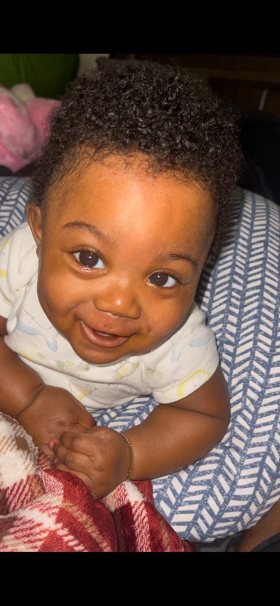 Bentley is registered to the contest to win money with this photo: arm, baby_toddler_clothing, cheek, chin, ear, eye, eyebrow, face, forehead, fun, gesture, hair, happy, iris, lip, mouth, nose, person, skin, smile