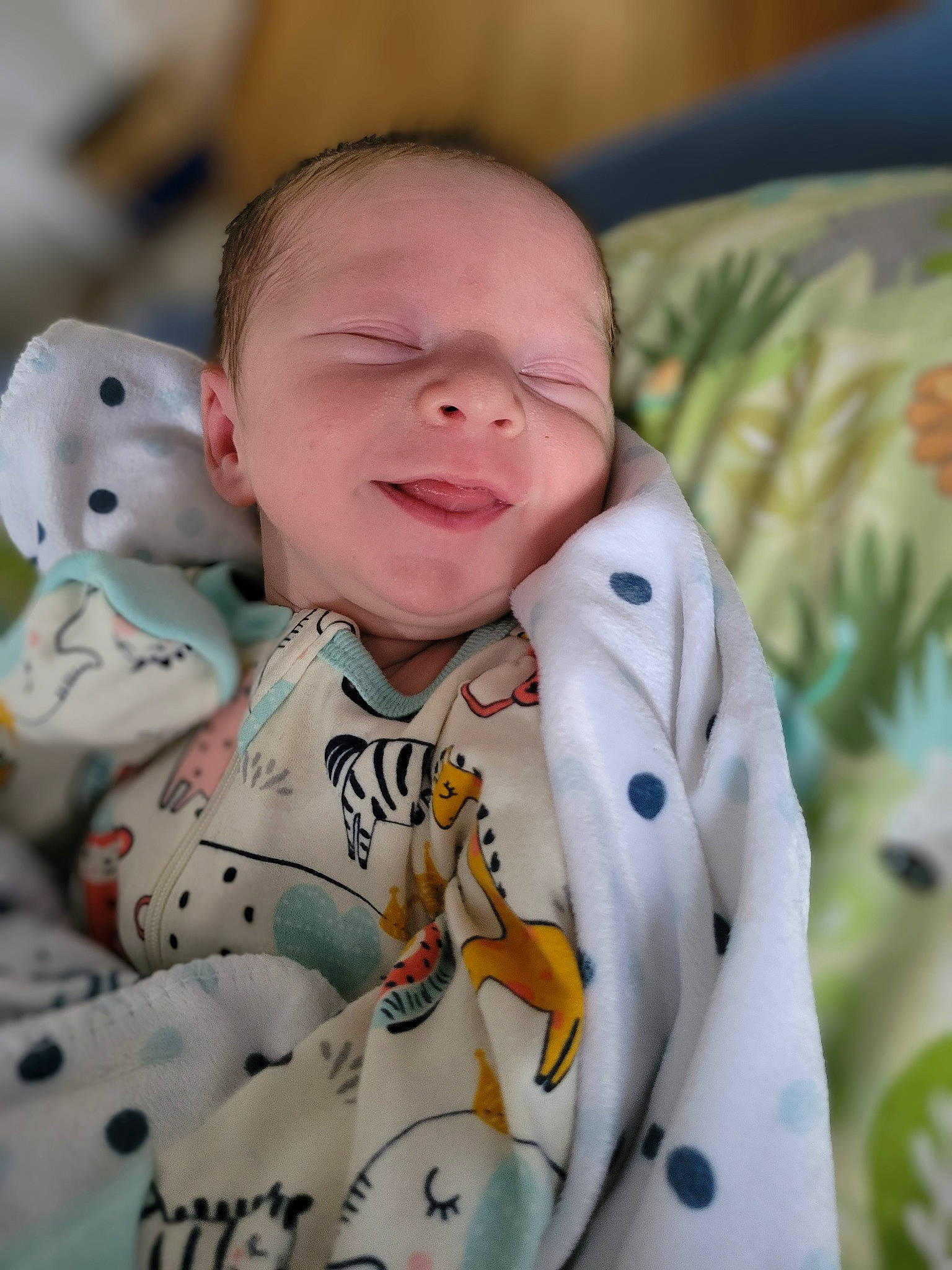 Jaxson joined the competition — help win amazing prizes! baby, baby_products, baby_toddler_clothing, cheek, child, event, grass, happy, laugh, linens, person, room, sitting, skin, sleeve, smile, t_shirt, toddler