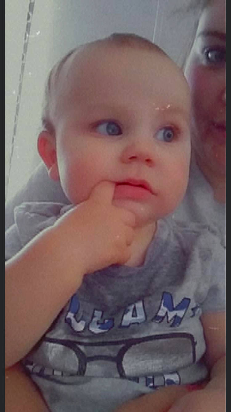 Nathaniel is registered to the contest to win money with this photo: baby, cheek, child, chin, cool, ear, eye, eyebrow, face, facial_expression, finger, forehead, hand, head, lip, mouth, nose, person, skin, smile