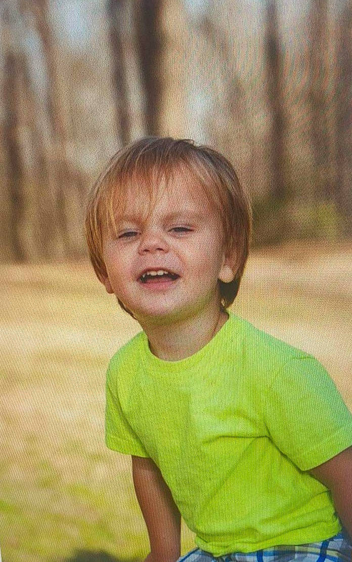Nathaniel is registered to the contest to win money with this photo: baby, baby_toddler_clothing, cheek, child, fun, grass, happy, laugh, leisure, lip, nose, people_in_nature, person, sitting, skin, sleeve, smile, standing, t_shirt, toddler