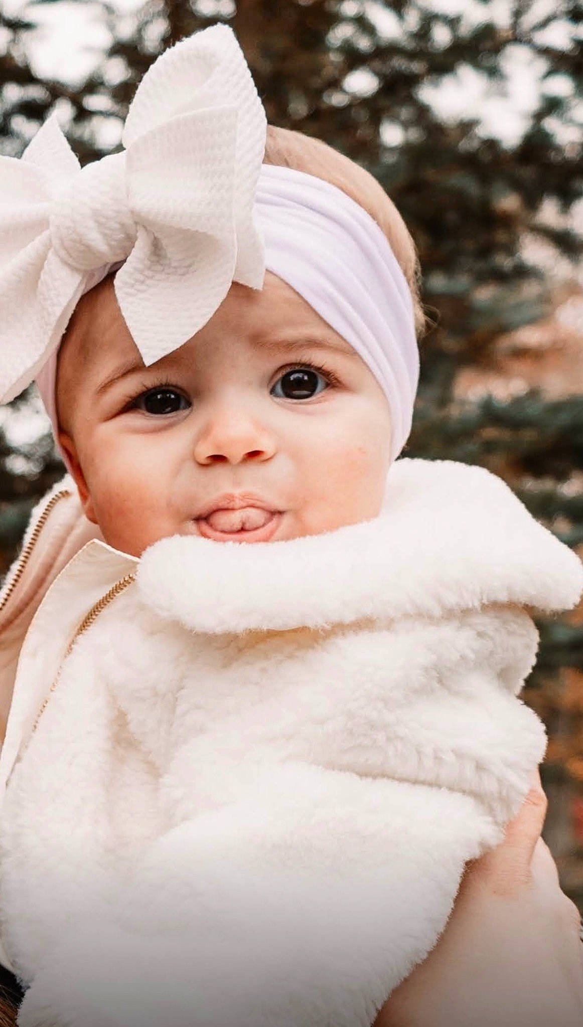 Aliyah is registered to the contest to win money with this photo: baby, baby_toddler_clothing, cap, child, dress, fashion_accessory, flash_photography, fur, grass, happy, hat, headwear, human_body, lip, outerwear, person, pink, skin, sleeve, toddler