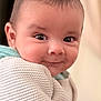 Ezekiel a rejoint le concours — aidez-le/la à gagner de superbes lots ! baby, child, face, smile, eyes, blanket, hand, knitwear, portrait, cute, infant, skin, expression, warm, indoor, person, young, head, closeup, cozy