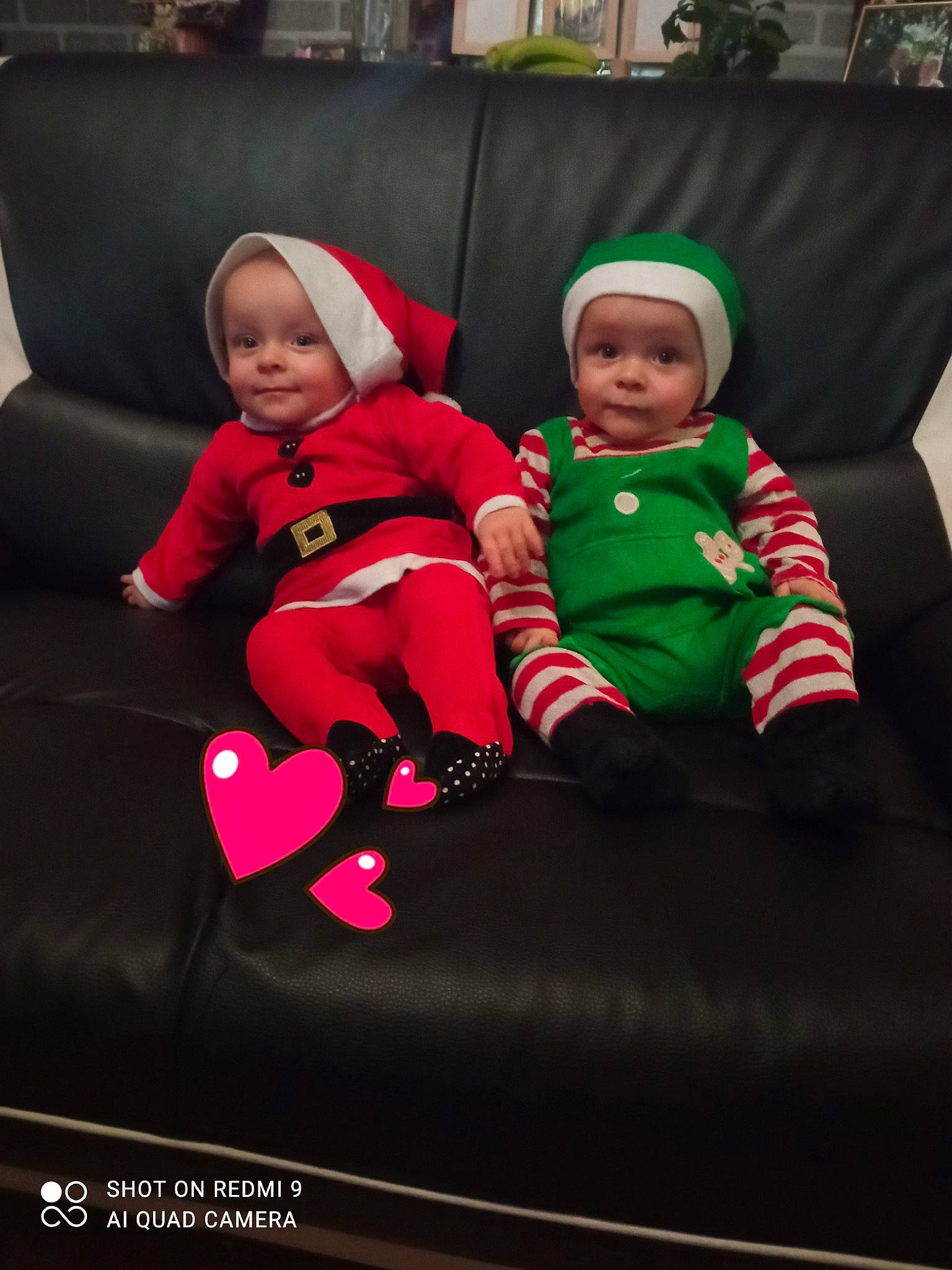 Marley Maylone participe au concours pour gagner de l'argent avec cette photo : baby, baby_toddler_clothing, carmine, child, christmas_decoration, christmas_ornament, comfort, costume_hat, couch, event, fictional_character, fun, happy, hat, headwear, holiday, human_body, joy, lap, person