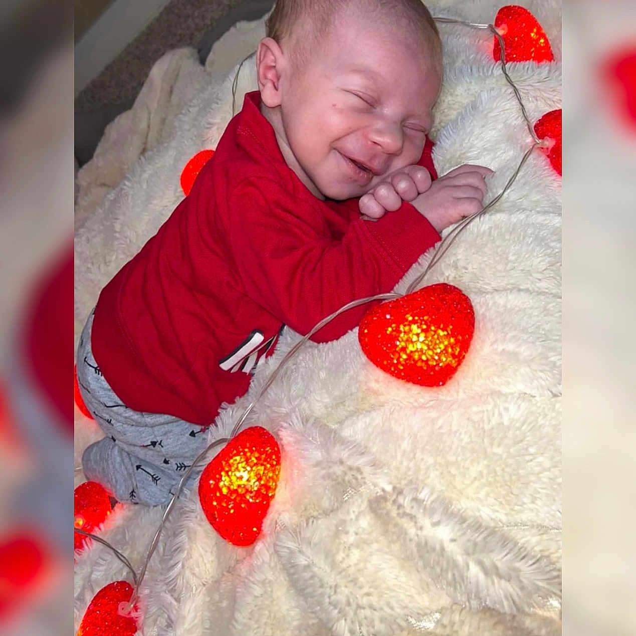 Miles joined the competition — help win amazing prizes! baby, bed, blanket, bodypart, clothing, face, finger, furniture, glove, hand, happy, head, laughing, newborn, person, photography, portrait, quilt, sleeping, smile