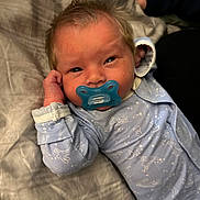 Shawn joined the competition — help win amazing prizes! baby, bed, bodypart, clothing, coat, couch, cushion, face, finger, furniture, hand, happy, head, homedecor, newborn, pants, person, photography, portrait, smile