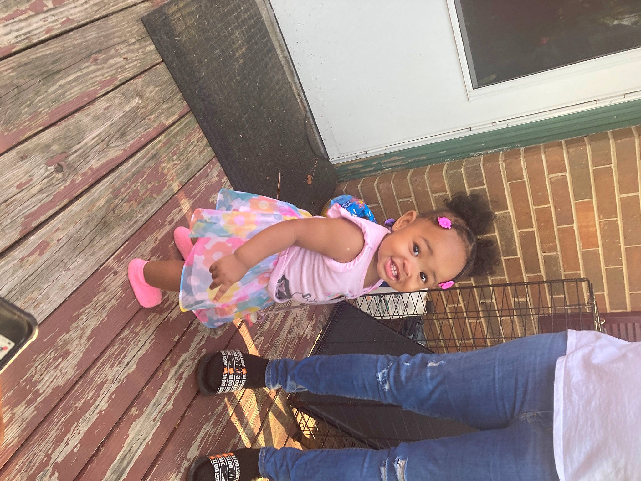 Jashaunti is registered to the contest to win money with this photo: arm, baby_toddler_clothing, child, electric_blue, flooring, fun, happy, hardwood, hat, joy, leisure, magenta, person, plank, purple, sandal, sitting, sneakers, thigh, toddler