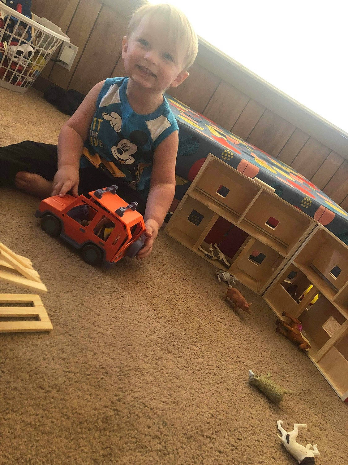 William joined the competition — help win amazing prizes! bag, box, cardboard, child, floor, flooring, fun, hardwood, joy, luggage_and_bags, machine, orange, person, personal_protective_equipment, recreation, shipping_box, smile, standing, t_shirt, toddler