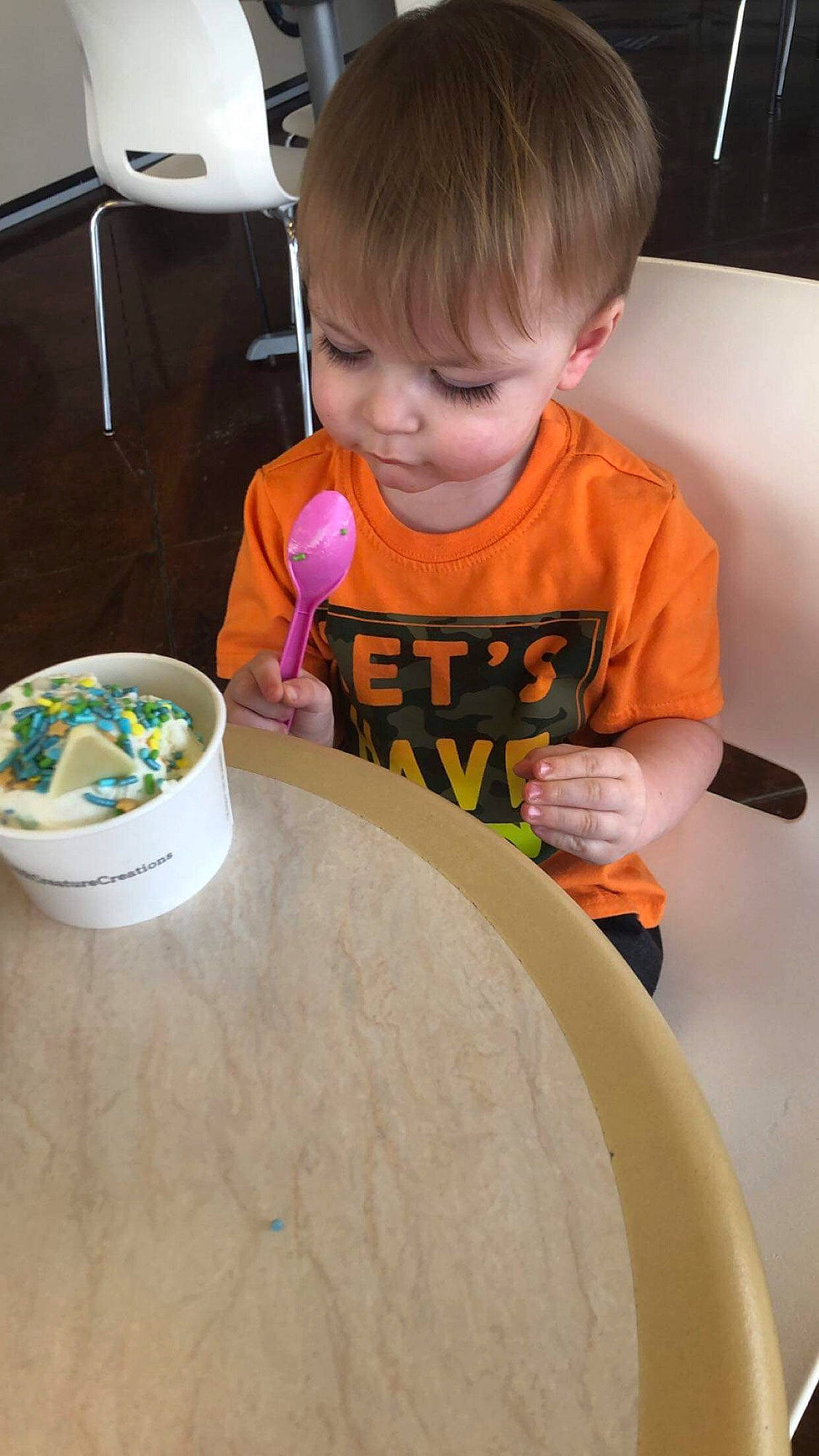 Benton joined the competition — help win amazing prizes! baby_toddler_clothing, chair, child, circle, cooking, curious, fun, person, play, science, shirt, t_shirt, table, tableware, toddler, vacation, visual_arts, wood, wood_stain