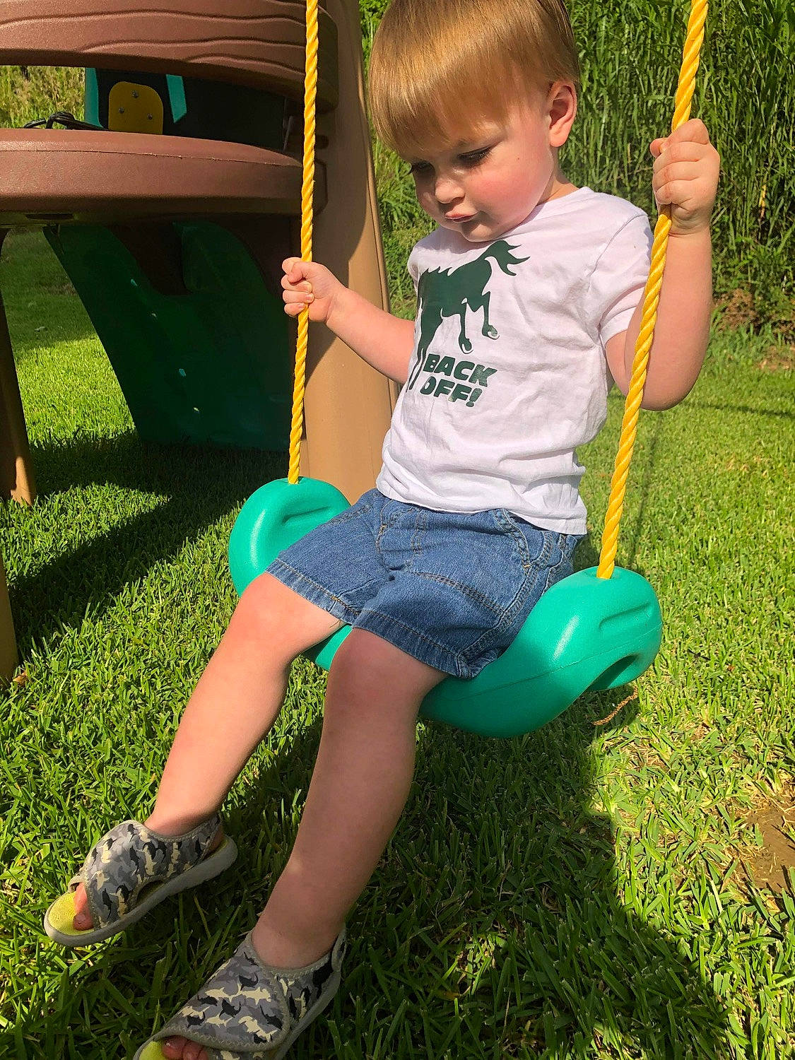 Benton joined the competition — help win amazing prizes! baby_toddler_clothing, chair, child, fun, grass, green, happy, leaf, leg, leisure, people_in_nature, person, photograph, plant, public_space, recreation, shorts, summer, swing, toddler