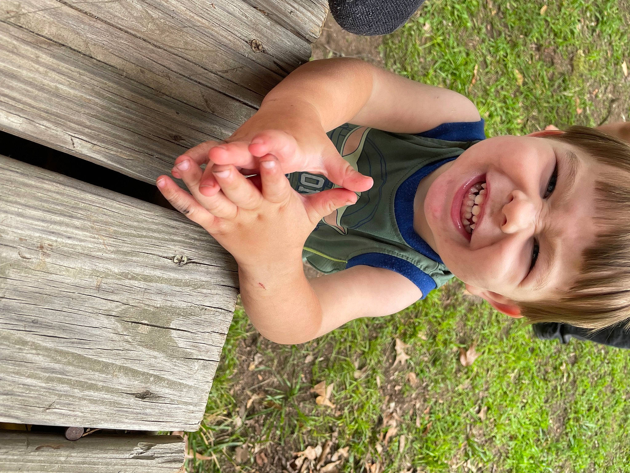 Jaxon joined the competition — help win amazing prizes! baby_toddler_clothing, finger, gesture, grass, hand, happy, human_body, leaf, leisure, nail, nose, people_in_nature, person, plant, skin, smile, thumb, toddler, tree, wood
