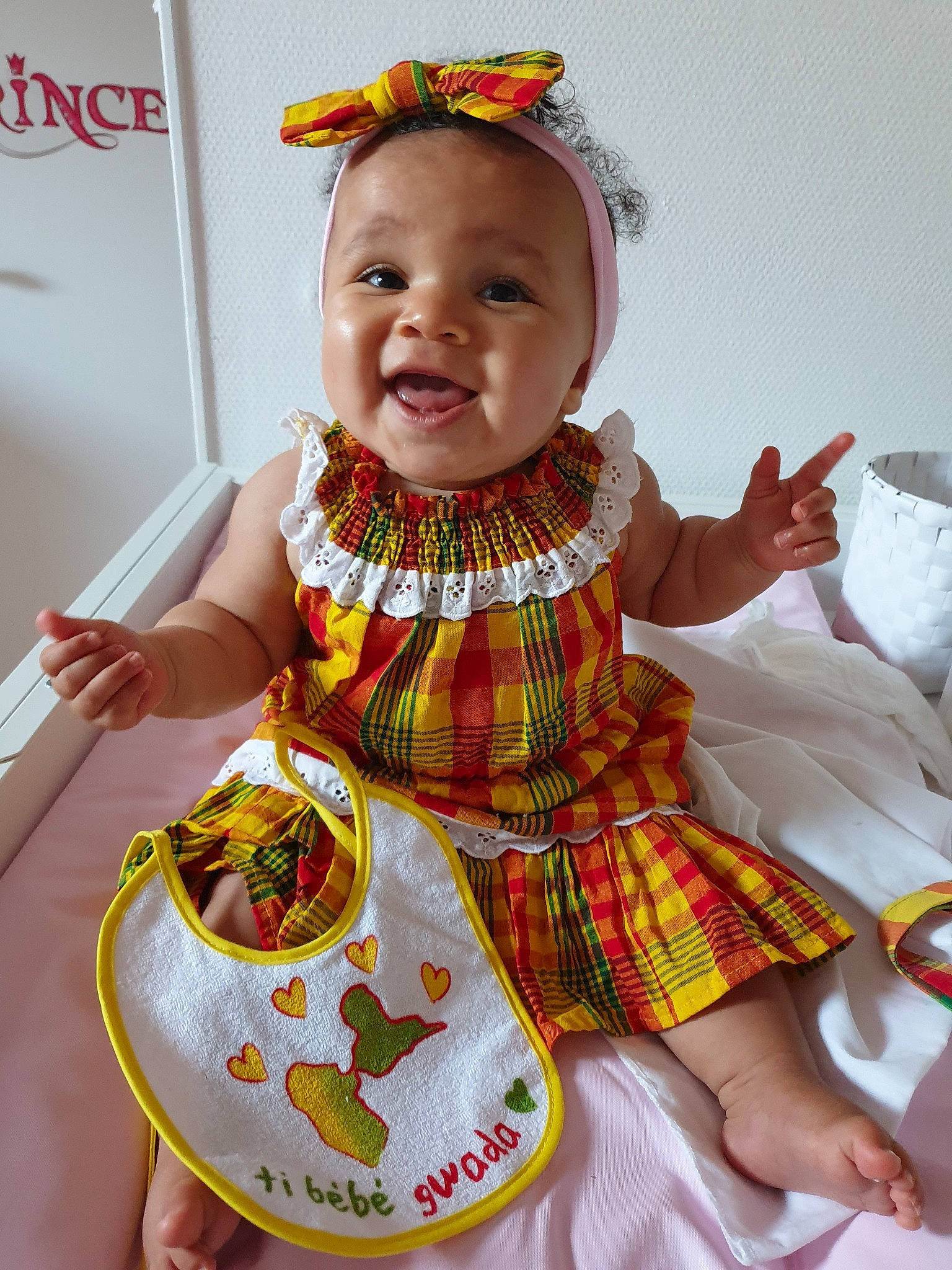 Kélyanna a rejoint le concours — aidez-le/la à gagner de superbes lots ! baby, baby_toddler_clothing, child, dress, person, smile, toddler, yellow