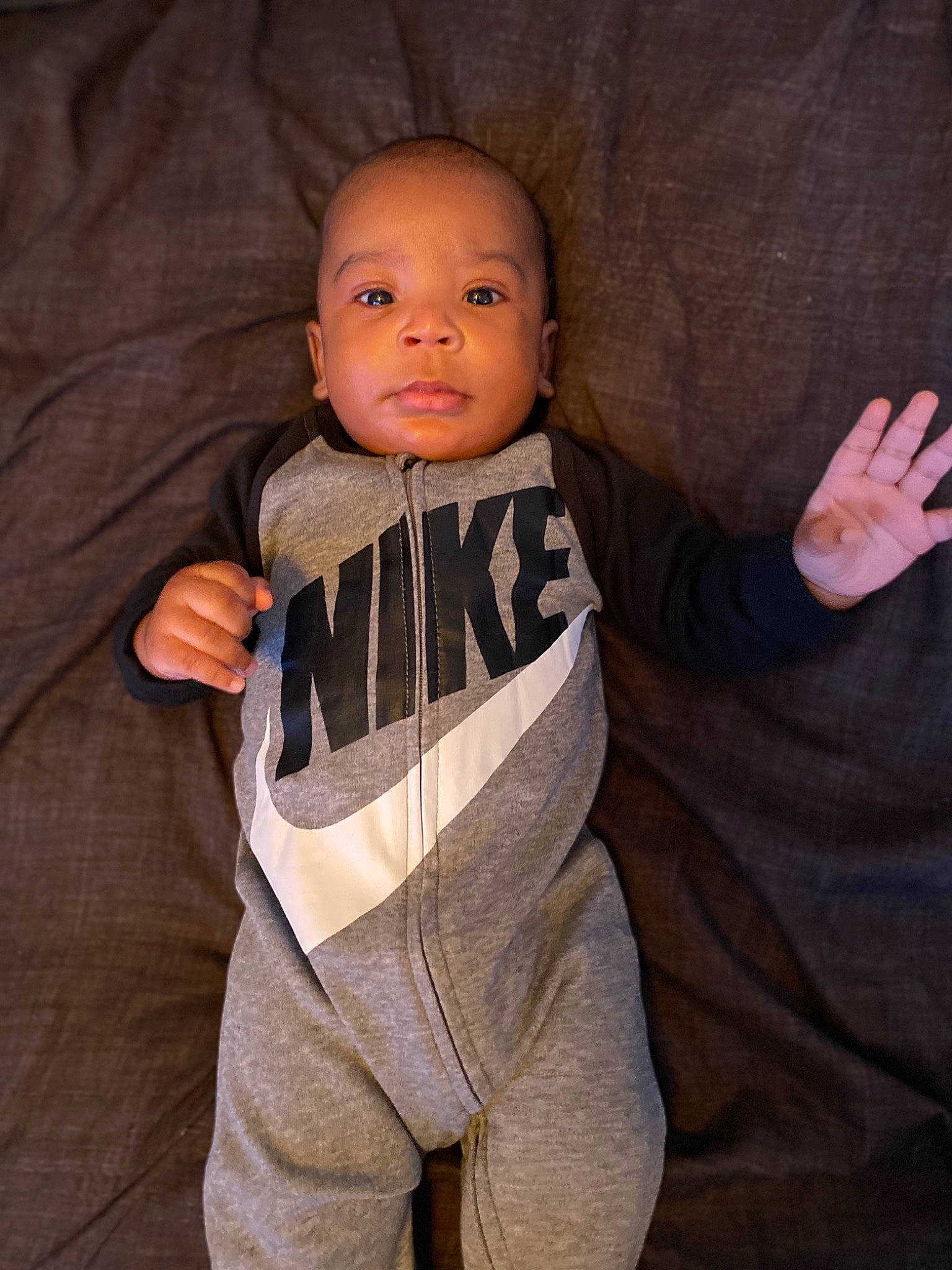 Jonah joined the competition — help win amazing prizes! baby, baby_toddler_clothing, cheek, comfort, finger, flash_photography, gesture, hand, happy, human_body, mammal, orange, outerwear, person, personal_protective_equipment, skin, sleeve, smile, thumb, toddler