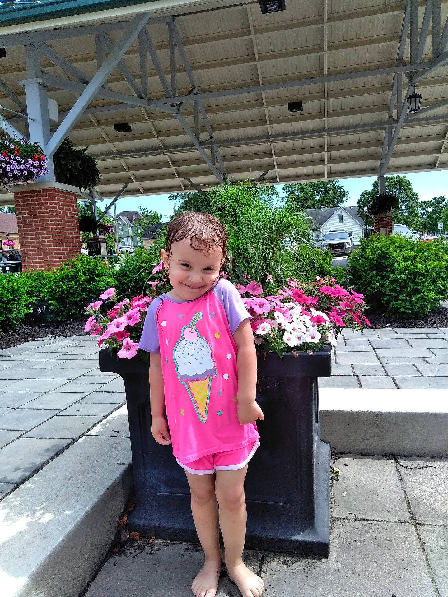 Cyah Leah Marie Hawkins is registered to the contest to win money with this photo: child, day, floristry, flower, flower_arranging, fun, garden, girl, headwear, joy, person, pink, plant, public_space, recreation, road, smile, snapshot, street, temple