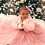 Vaiana a rejoint le concours — aidez-le/la à gagner de superbes lots ! child, tutu, pink, dress, tiara, bow, ball, flower, greenery, leaves, white, shoes, fur_jacket, sitting, cute, portrait, indoor, decor, fairy_tale, serious