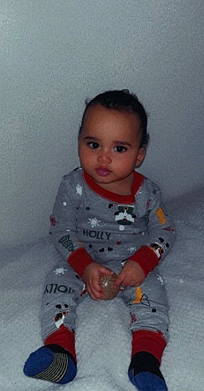 Jacob joined the competition — help win amazing prizes! arm, baby, baby_toddler_clothing, carmine, cheek, child, chin, comfort, eye, hairstyle, head, human_body, iris, nose, pattern, person, sitting, skin, sleeve, thumb