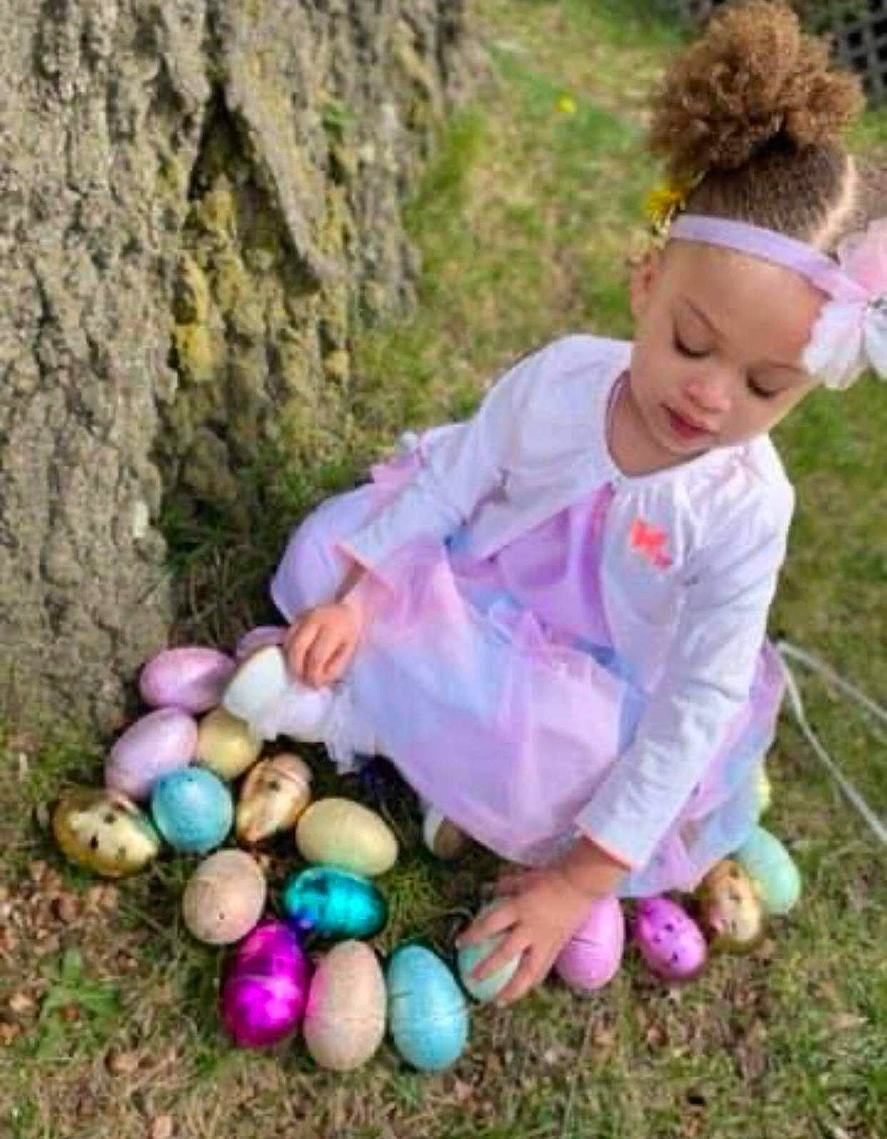 Avianna is registered to the contest to win money with this photo: baby_toddler_clothing, ball, child, easter, easter_egg, egg, event, fun, grass, happy, headband, headpiece, holiday, nature, people_in_nature, person, recreation, smile, toddler, wood