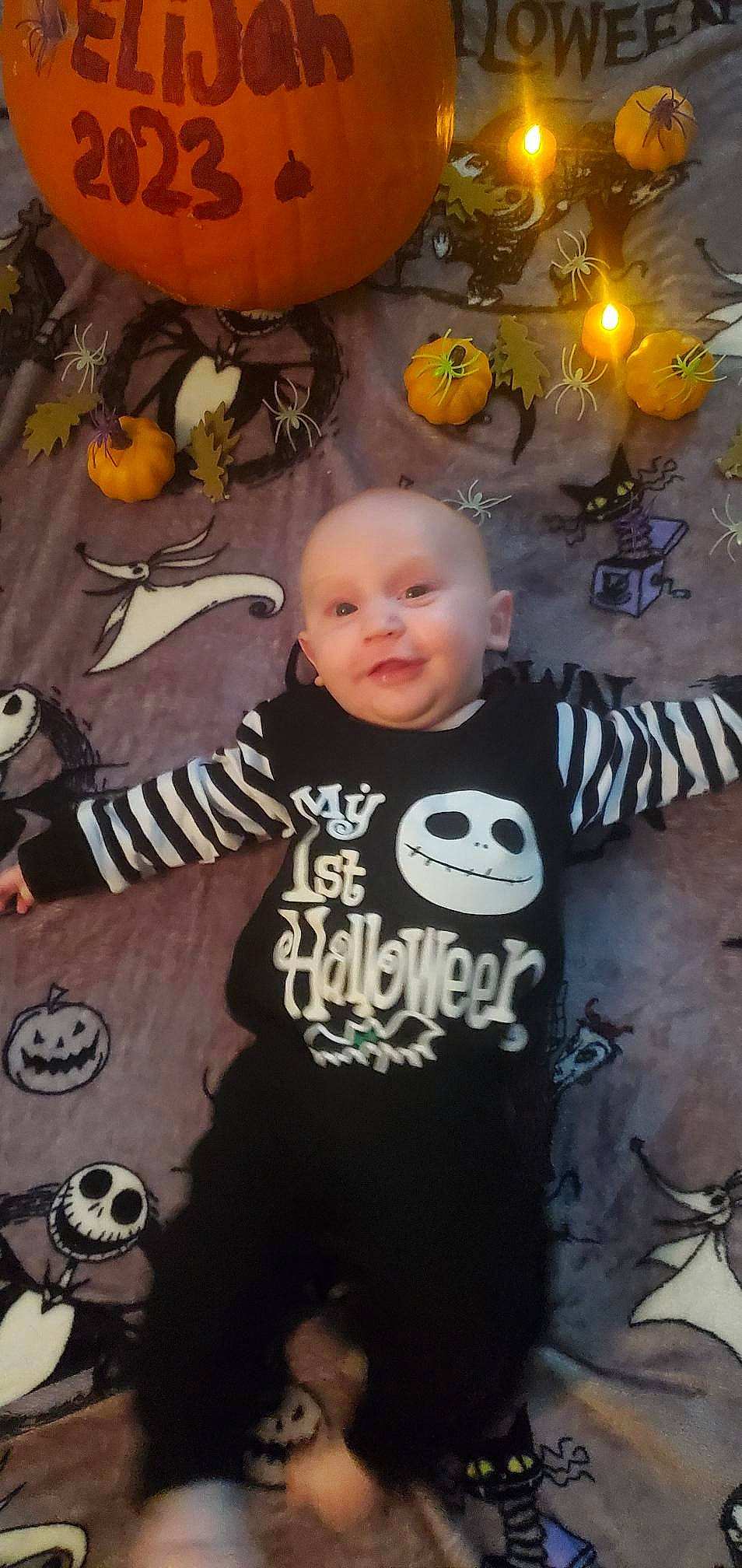 Elijah is registered to the contest to win money with this photo: baby, baby_toddler_clothing, calabaza, cheek, child, cucurbita, flash_photography, flooring, fun, gourd, happy, orange, person, plant, pumpkin, sleeve, smile, toddler, vegetable, winter_squash