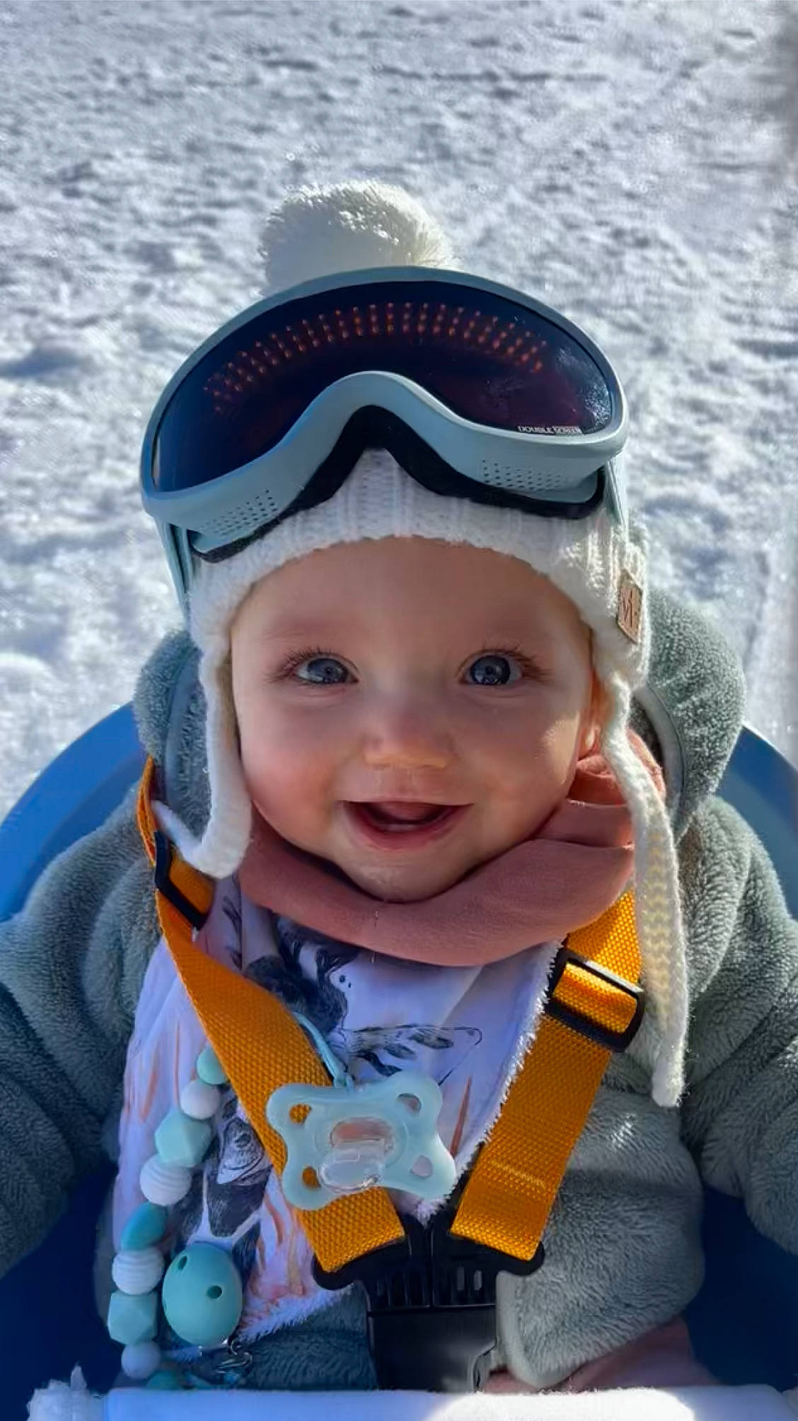 Angèle participe au concours pour gagner de l'argent avec cette photo : azure, baby, baby_toddler_clothing, cap, cheek, child, cool, electric_blue, facial_expression, fashion_accessory, freezing, fun, happy, headwear, person, personal_protective_equipment, skin, sleeve, smile, snow