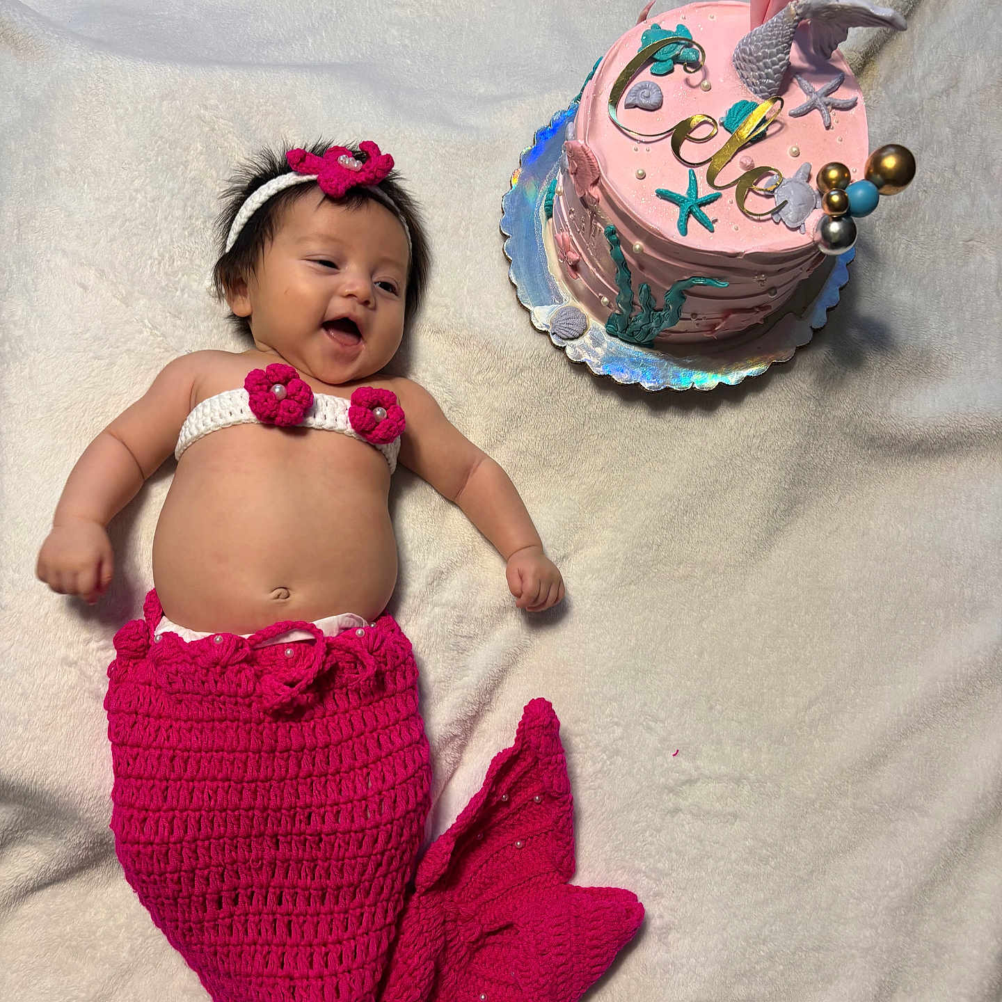 Celena is registered to the contest to win money with this photo: baby, birthdaycake, bodypart, cake, clothing, cream, cupcake, dessert, face, finger, food, glove, hand, hat, head, hosiery, icing, person, photography, portrait