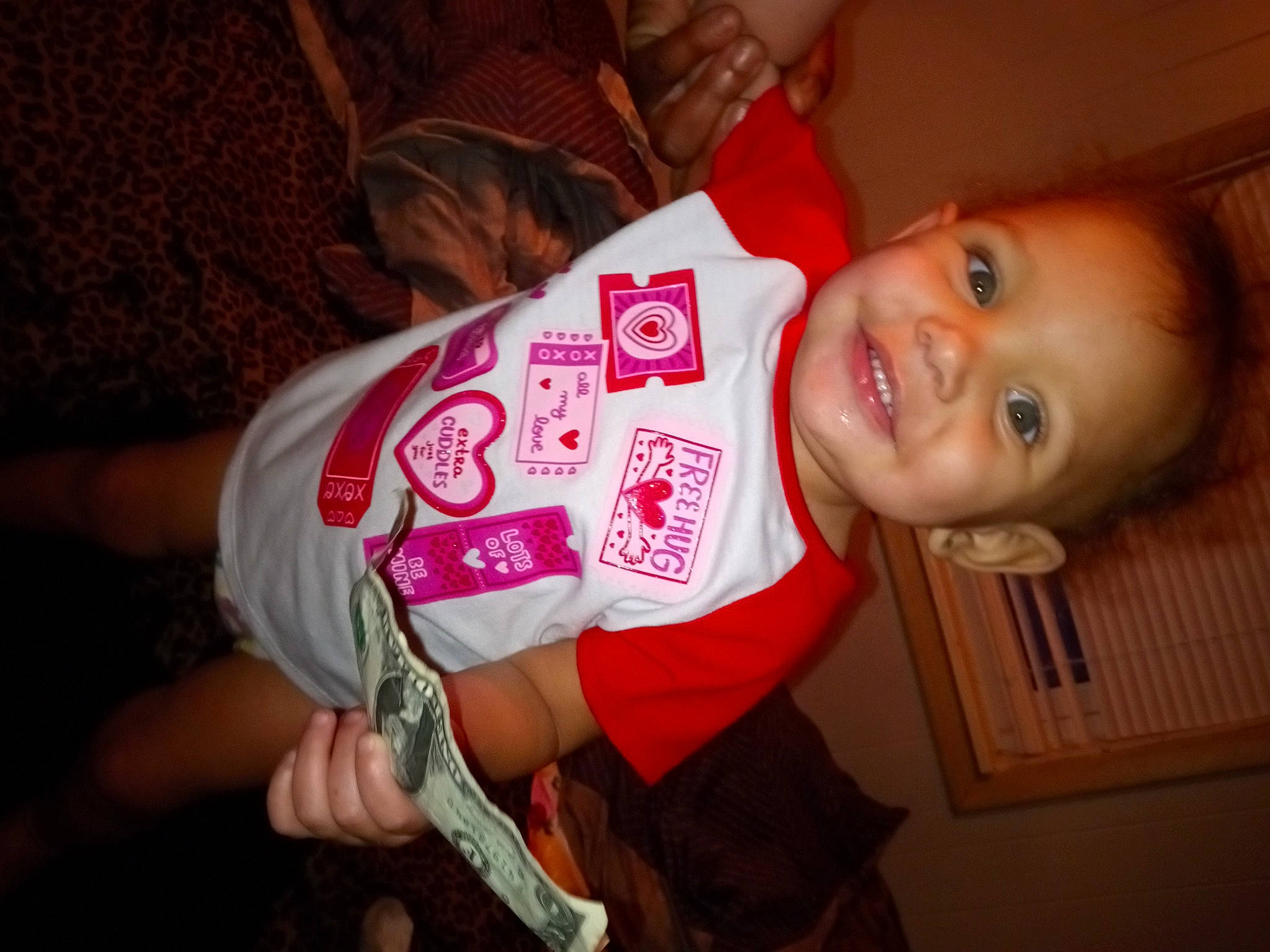 Royalty is registered to the contest to win money with this photo: baby, baby_toddler_clothing, cheek, child, chin, elbow, facial_expression, finger, fun, happy, head, joy, lip, mouth, nail, nose, person, skin, sleeve, smile