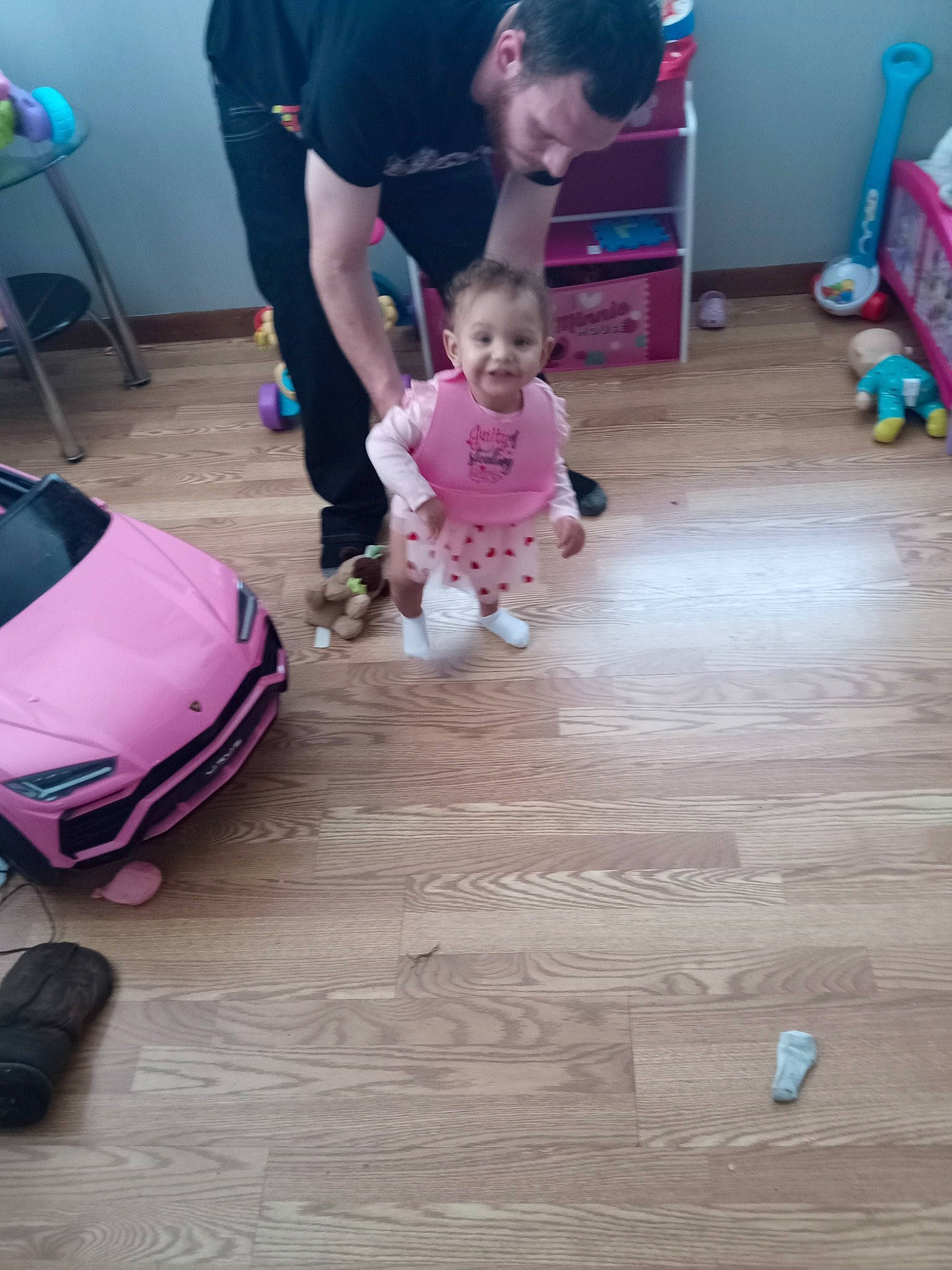 Royalty is registered to the contest to win money with this photo: automotive_design, automotive_exterior, automotive_tire, baby, blue, chair, child, floor, flooring, fun, happy, hardwood, hood, joy, leisure, magenta, person, tire, toddler, vehicle_door