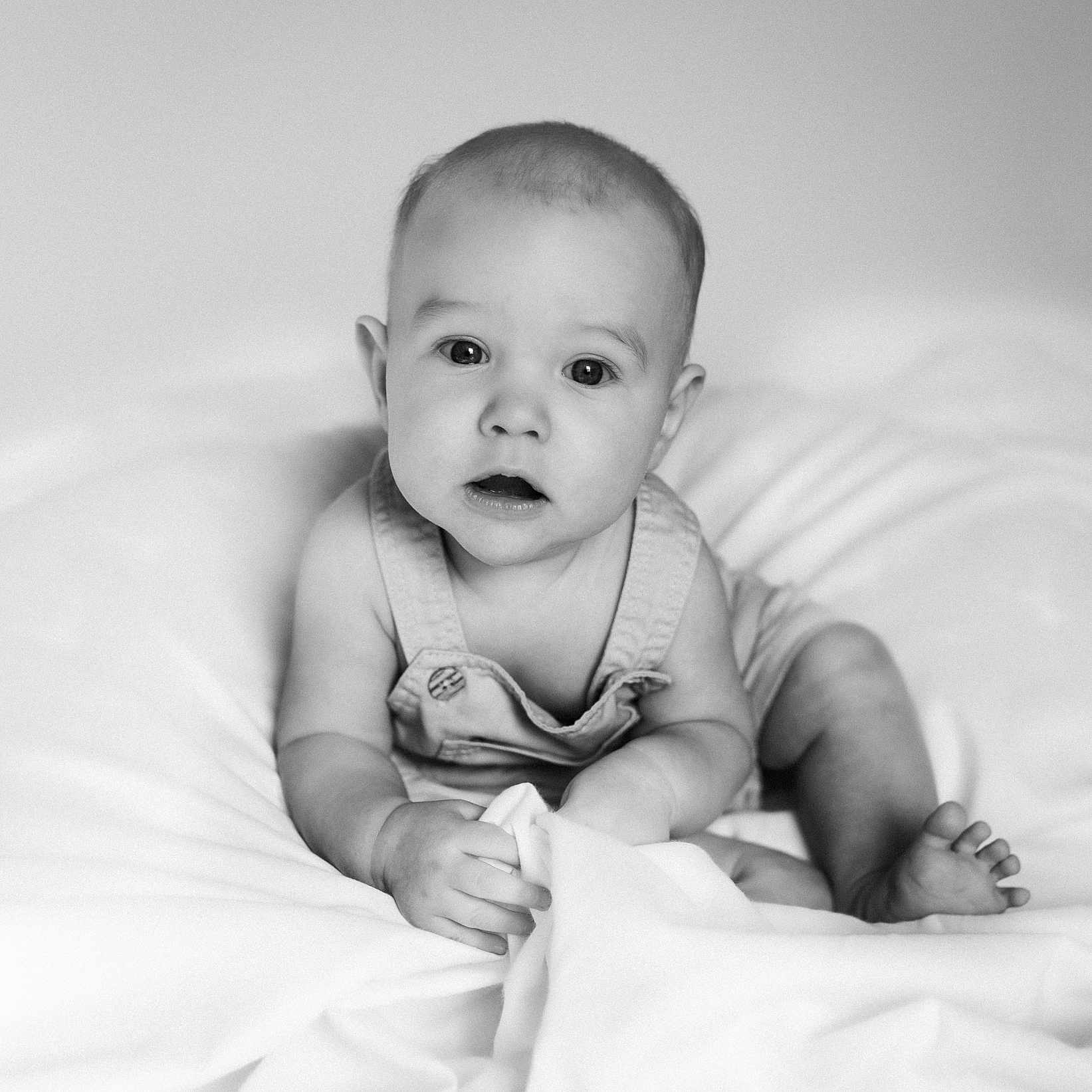 Dawson joined the competition — help win amazing prizes! baby, bed, bedroom, bodypart, couch, crawling, face, finger, furniture, hand, happy, head, indoors, newborn, person, photography, portrait, room, sitting, smile
