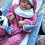 Talia-Jane joined the competition — help win amazing prizes! baby, infant, smile, pink_onesie, fluffy_clothing, baby_seat, toy, zebra_toy, pacifier, white_bib, headwear, happy, cozy, indoor, carpet, cushion, child, person, cute, relaxed