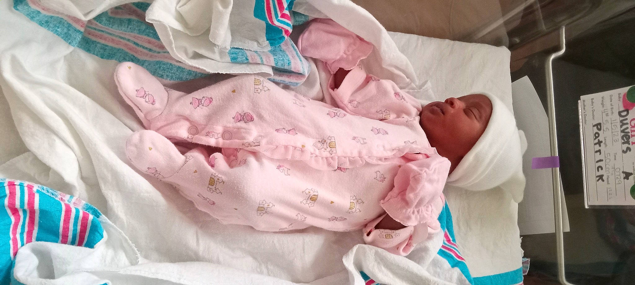 Taylor joined the competition — help win amazing prizes! baby, baby_products, baby_safety, baby_sleeping, baby_toddler_clothing, bedding, bedtime, child, comfort, event, flesh, infant_bed, linens, magenta, pattern, peach, person, pink, room, sleeve