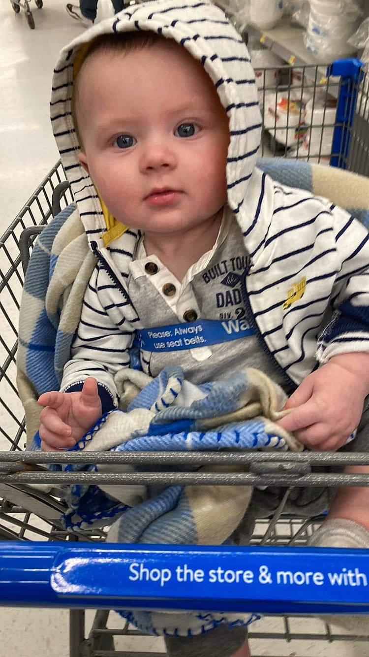 Kason joined the competition — help win amazing prizes! advertising, automotive_exterior, baby, baby_carriage, baby_products, baby_safety, baby_toddler_clothing, blue, cap, cheek, child, city, electric_blue, organ, people, person, photo_caption, publication, sitting, sleeve