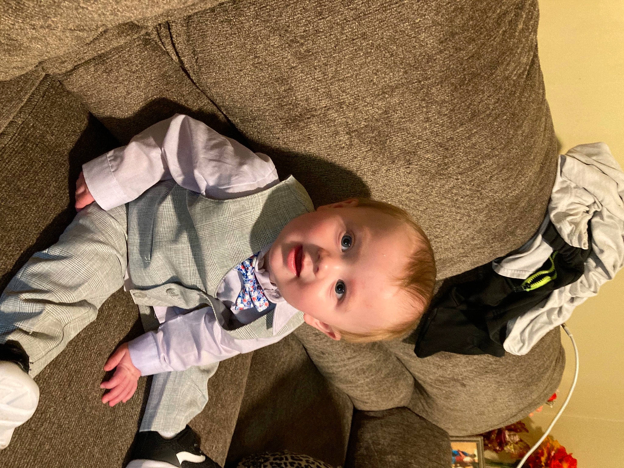 Kason is registered to the contest to win money with this photo: baby, baby_carriage, baby_products, baby_toddler_clothing, cheek, child, comfort, eye, face, grass, head, nose, outerwear, person, sitting, skin, toddler, tree, wood