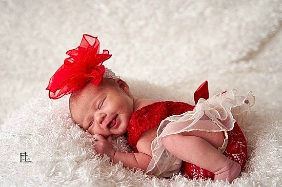 Johnnie joined the competition — help win amazing prizes! baby, baby_sleeping, baby_toddler_clothing, child, comfort, dress, face, flash_photography, grass, happy, headband, headgear, headpiece, linens, lip, person, petal, pink, skin, textile