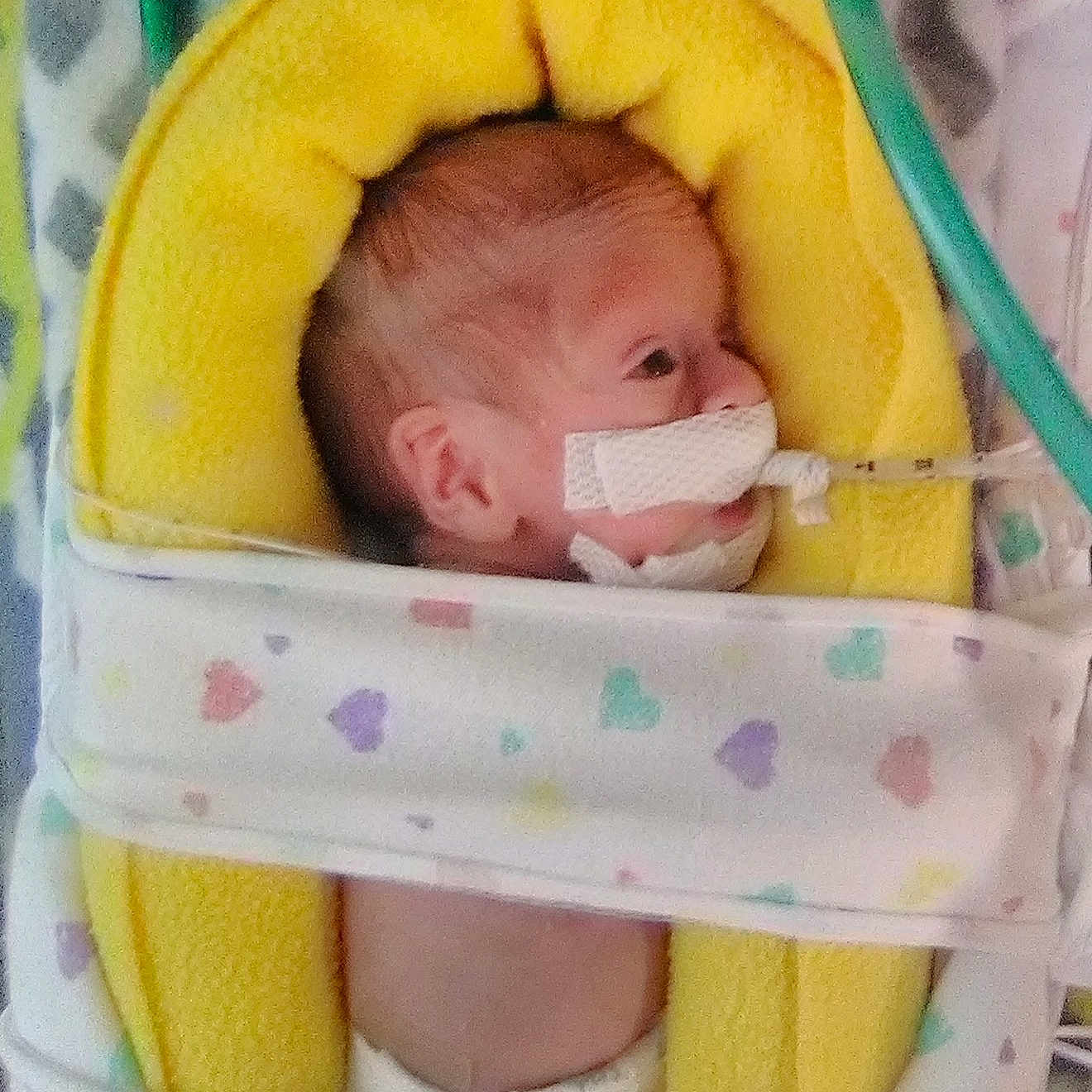 Triston is registered to the contest to win money with this photo: baby_products, baby_toys, bed, child, infant, infant_bed, play, product, stuffed_toy, toddler, toy, yellow