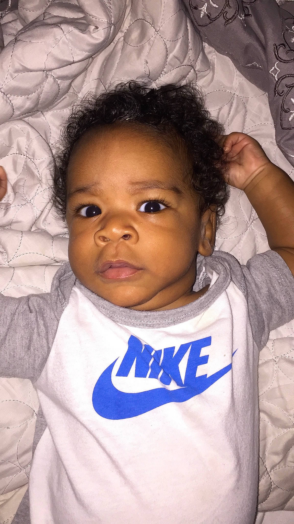 Juelz is registered to the contest to win money with this photo: baby, black_hair, cheek, child, cool, eye, eyebrow, face, forehead, hair, hairstyle, head, human, nose, person, s_curl, skin, smile, toddler