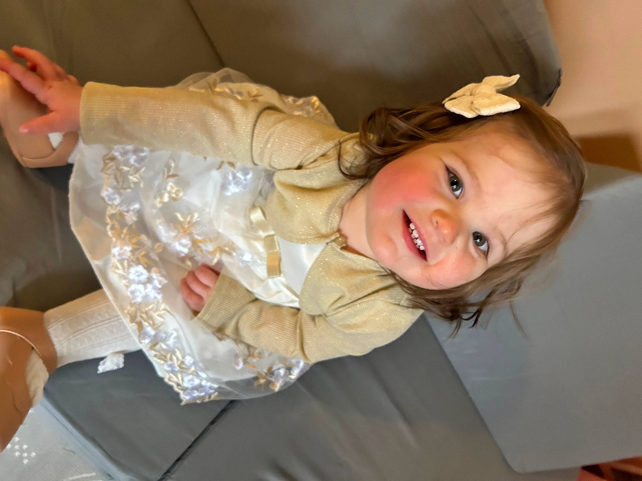 Avery is registered to the contest to win money with this photo: baby, baby_laughing, baby_toddler_clothing, blond, cheek, child, comfort, event, face, fun, happy, hat, head, iris, joy, laugh, person, room, sitting, smile