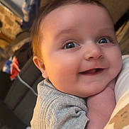 Asher joined the competition — help win amazing prizes! baby, smiling, face, child, infant, cute, eyes, clothing, ribbed, portrait, happy, skin, cheeks, indoor, cozy, closeup, person, head, expression, young