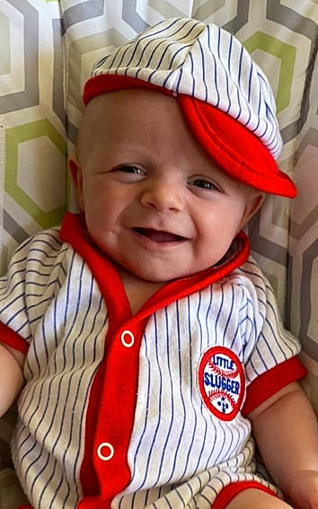Oleson joined the competition — help win amazing prizes! baby, baby_toddler_clothing, cap, cheek, chin, cool, eye, face, happy, headgear, headwear, human_body, lip, nose, organ, outerwear, person, skin, sleeve, smile
