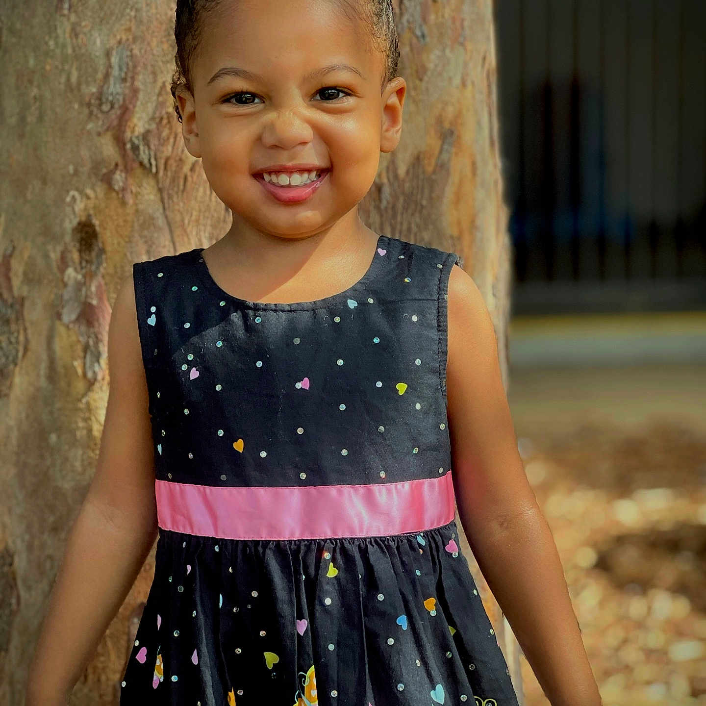 Baby J is registered to the contest to win money with this photo: bodypart, child, clothing, dress, eveningdress, face, female, formalwear, girl, hair, happy, head, pattern, person, photography, portrait, shoulder, sleeve, smile, standing