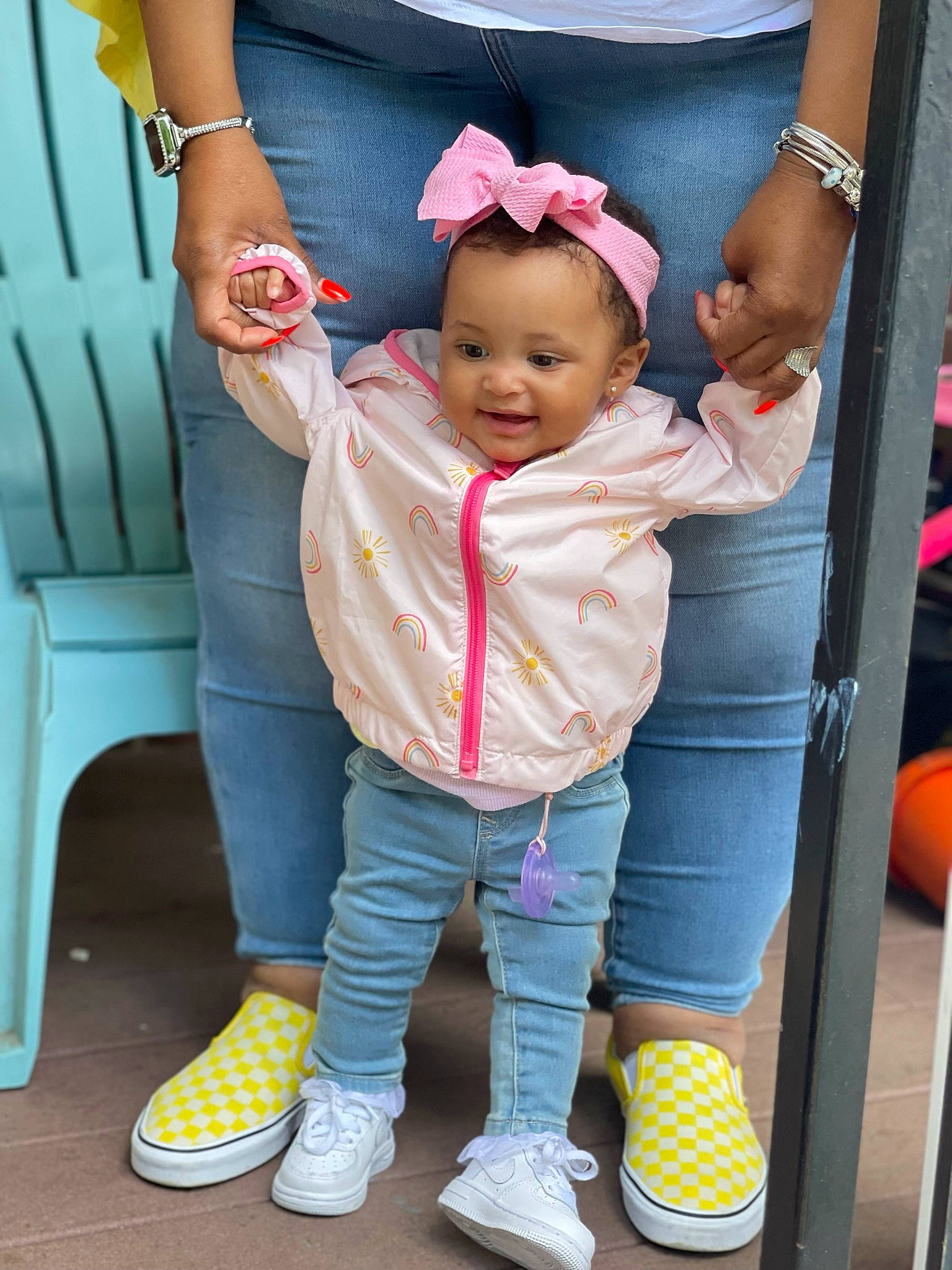 Halo is registered to the contest to win money with this photo: baby, baby_products, baby_toddler_clothing, blue, child, fashion_accessory, fun, gesture, hand, happy, magenta, person, pink, product, purple, sleeve, smile, sneakers, toddler, watch
