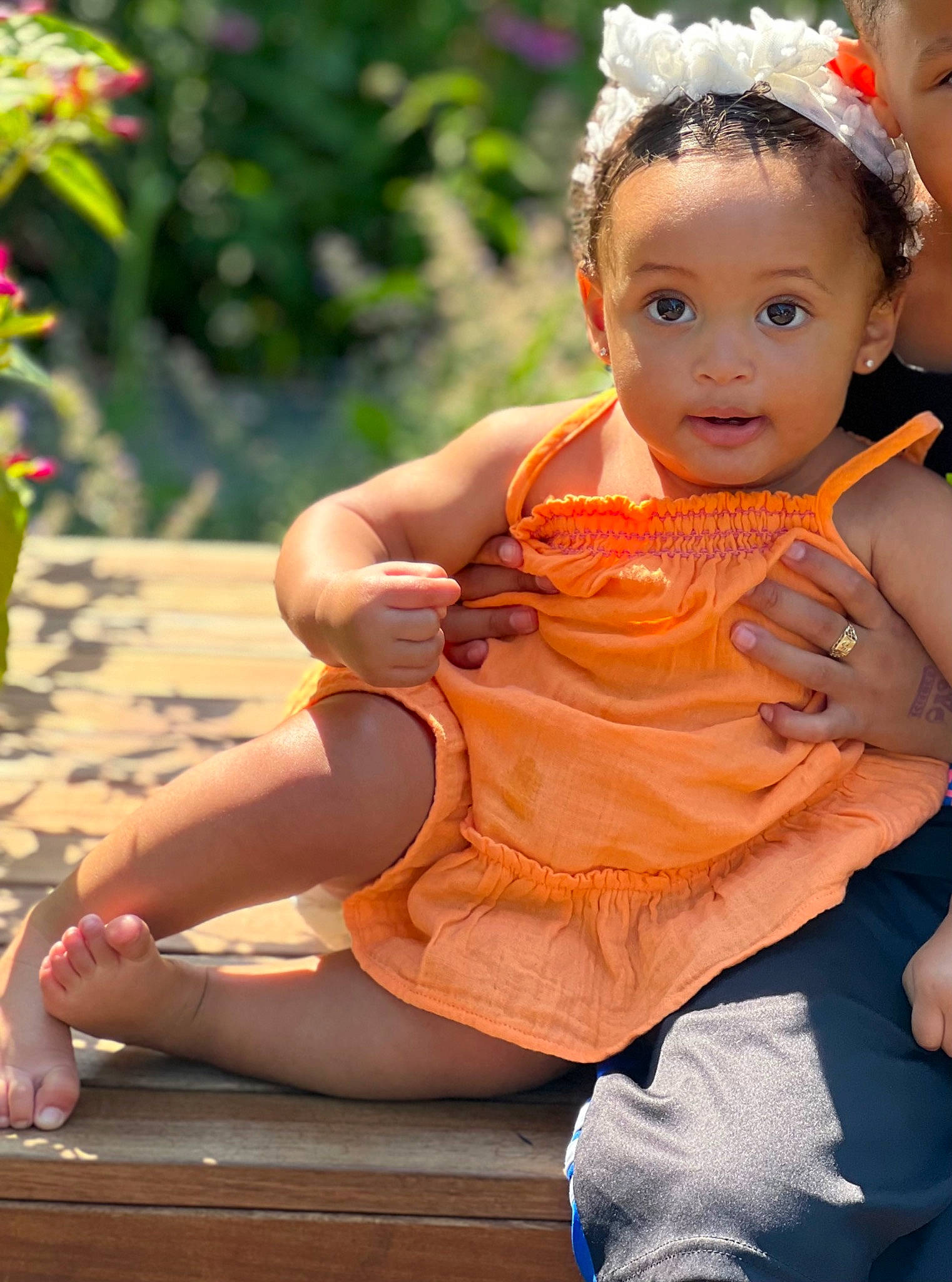 Halo joined the competition — help win amazing prizes! baby, baby_toddler_clothing, child, dress, eye, fun, grass, happy, human_leg, jewellery, leisure, orange, peach, person, photograph, plant, sandal, sitting, skin, thigh