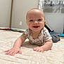 Stetson joined the competition — help win amazing prizes! baby, crawling, smiling, indoor, blanket, cute, child, infant, animal_print, shirt, happy, face, hands, floor, home, cozy, person, portrait, young, room