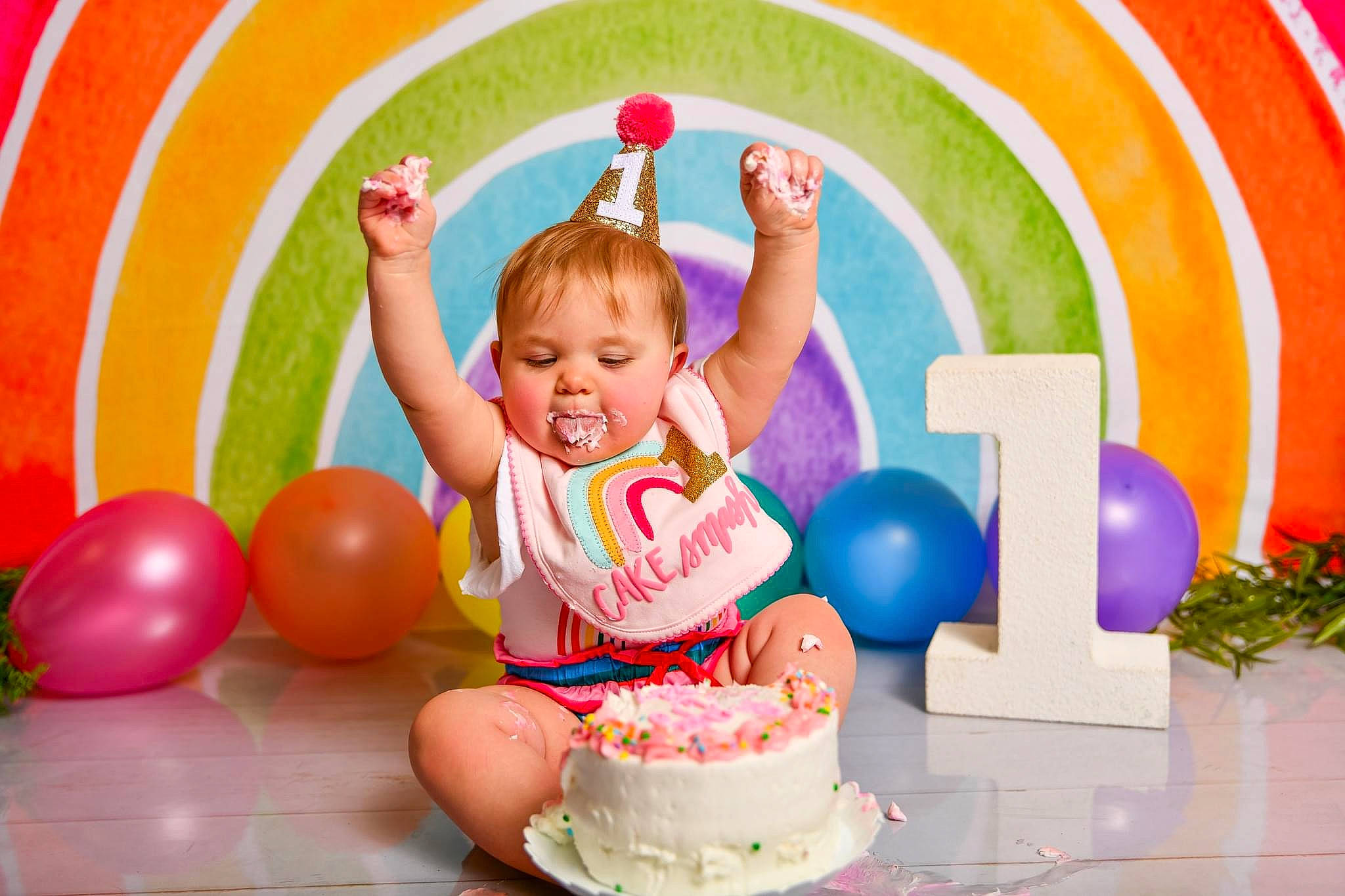 Terri joined the competition — help win amazing prizes! balloon, birthday_party, cake, cake_decorating, cake_decorating_supply, child, dessert, event, food, fun, happy, icing, leisure, party_supply, person, pink, shorts, smile, sugar_cake, toddler