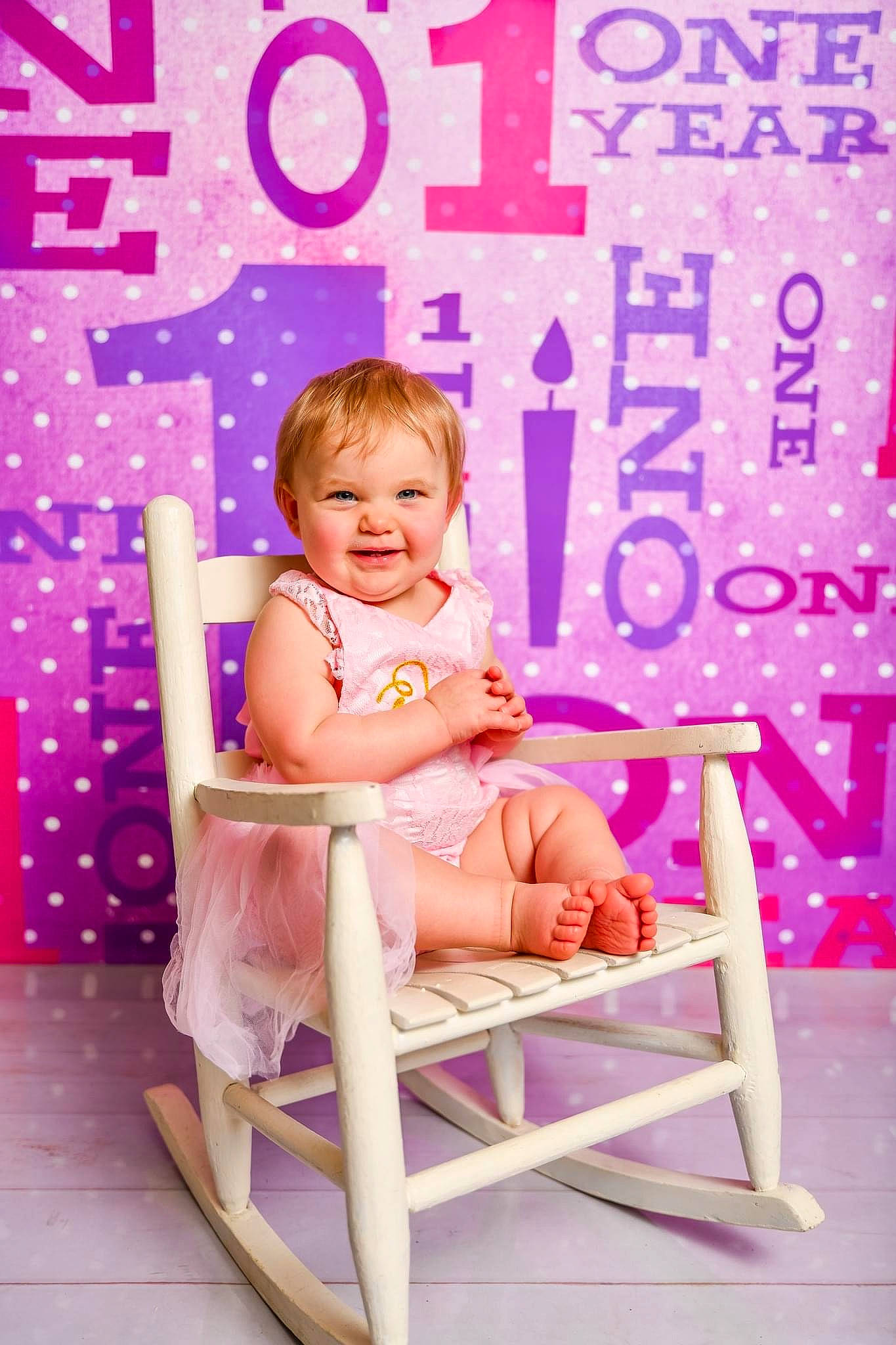 Terri joined the competition — help win amazing prizes! baby_toddler_clothing, chair, child, comfort, face, font, fun, happy, joy, leisure, magenta, pattern, peach, person, pink, purple, room, sitting, skin, smile
