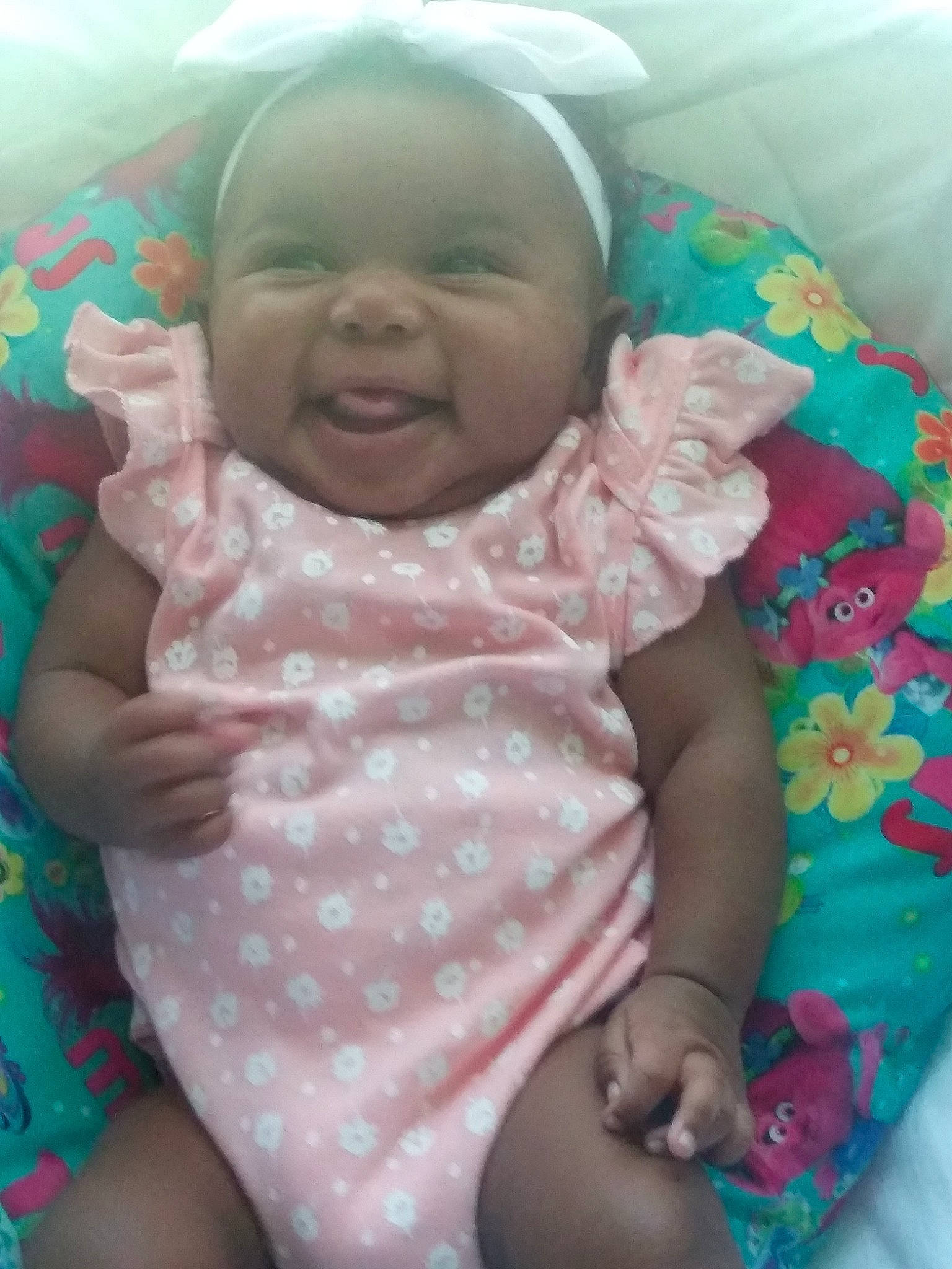 Nova is registered to the contest to win money with this photo: baby, birth, cheek, child, eye, face, facial_expression, head, person, pink, skin, smile, toddler