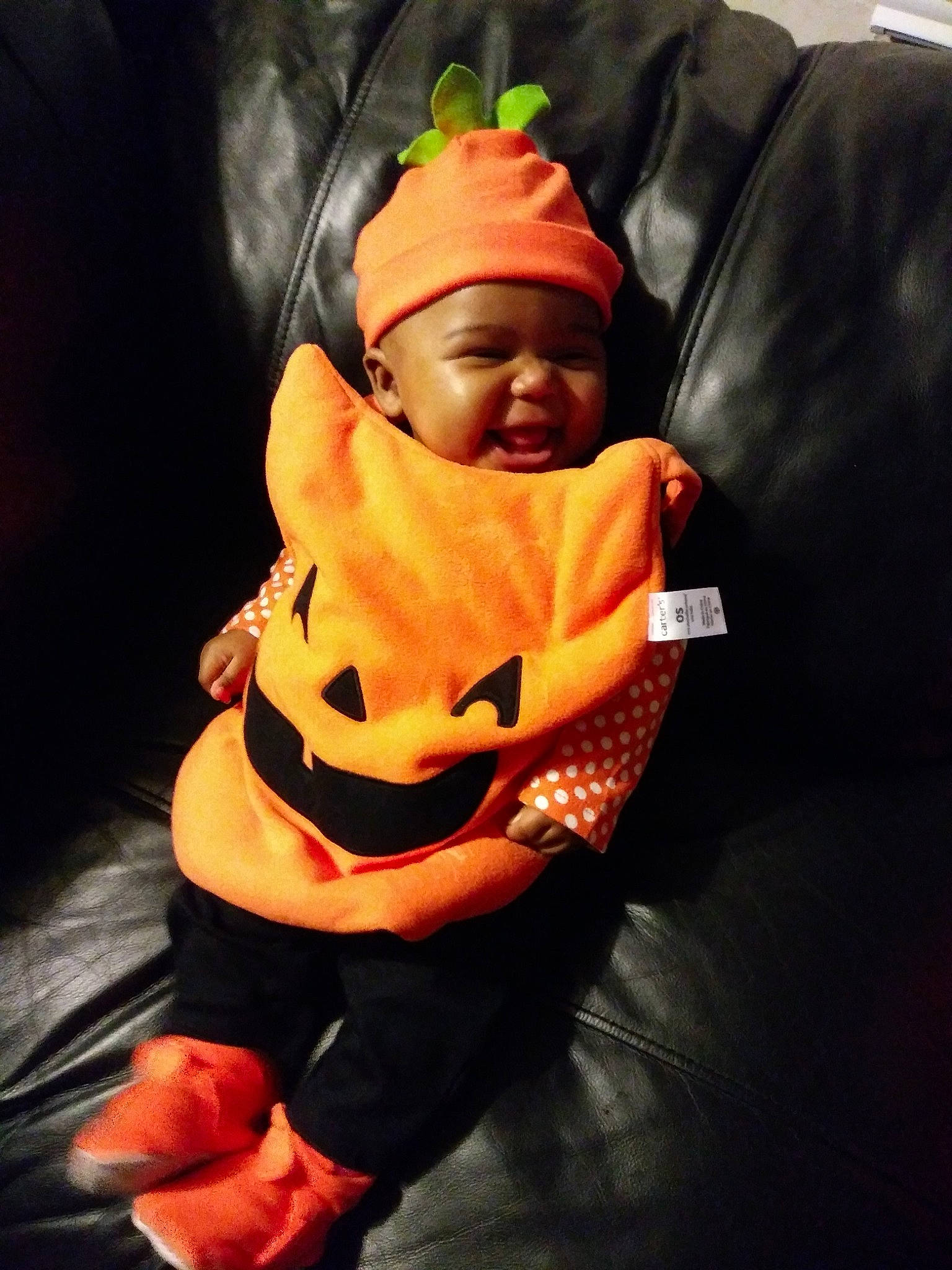 Nova is registered to the contest to win money with this photo: action_figure, baby, child, fictional_character, headwear, orange, person, toddler, toy