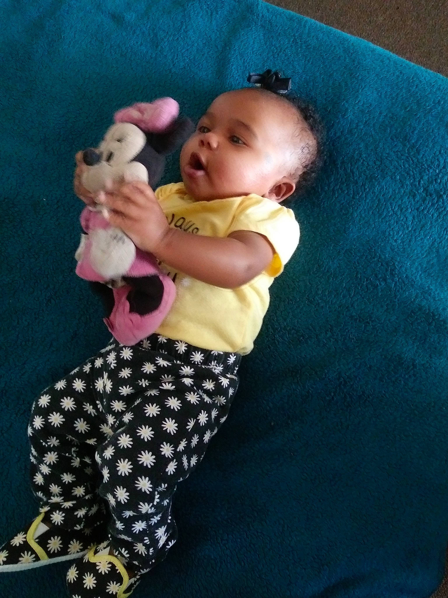 Nova is registered to the contest to win money with this photo: arm, baby, child, person, pink, smile, toddler